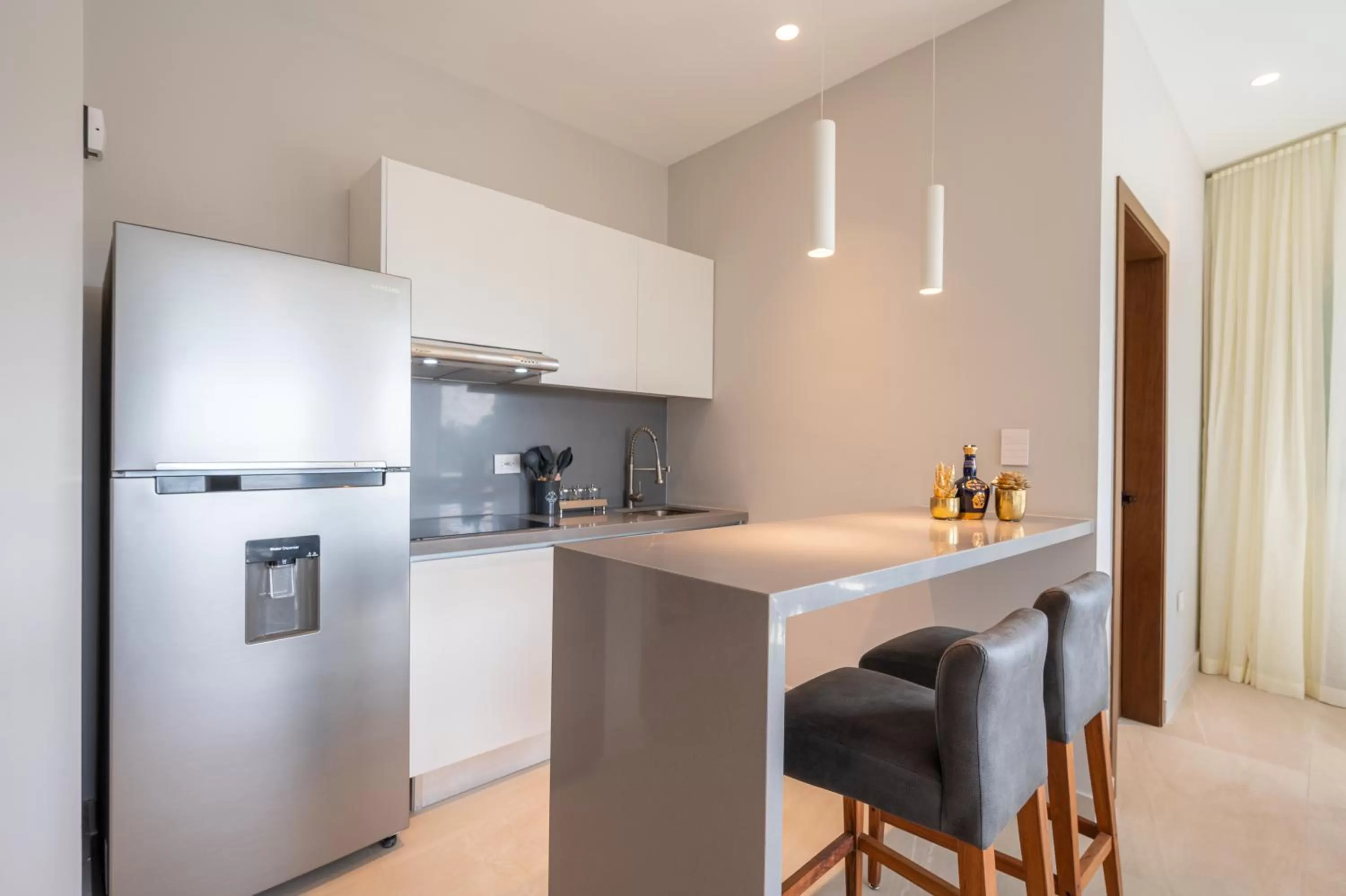 Kitchen or kitchenette in Kippal - Modern Oasis - ApartHotel