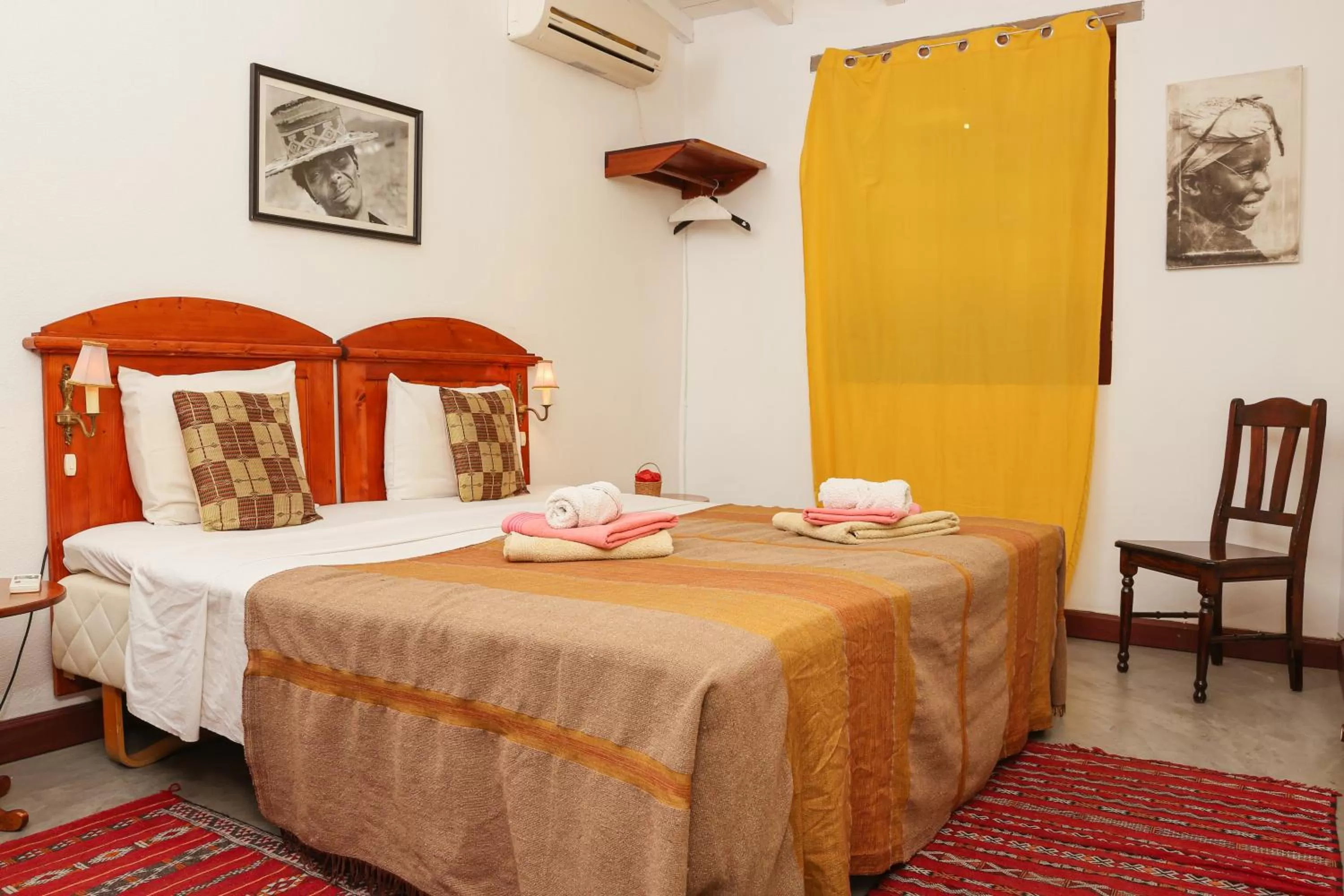 Bed in The Colonial Guest House