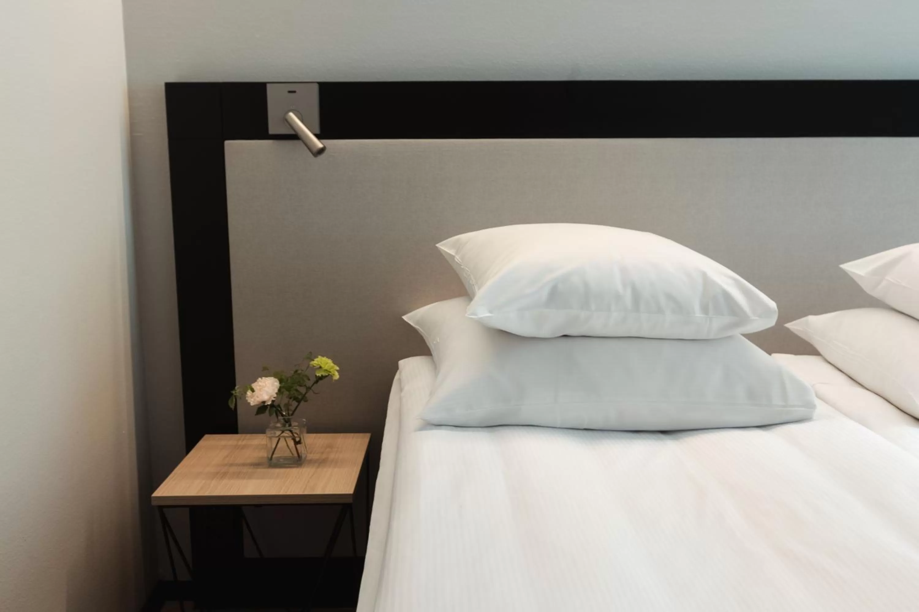 Bed in GLO Hotel Art