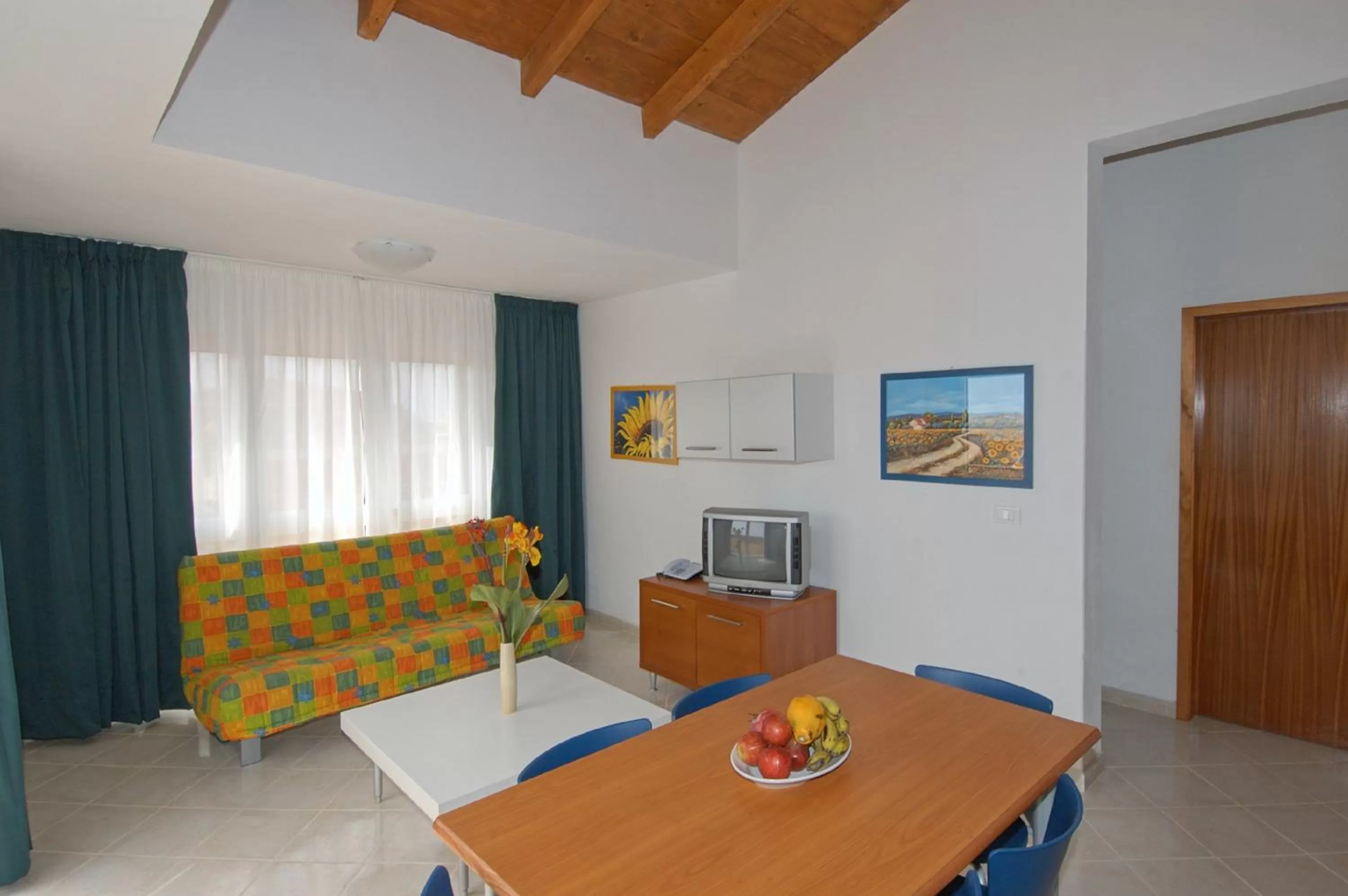 Communal lounge/ TV room in Aparthotel Ponta Preta