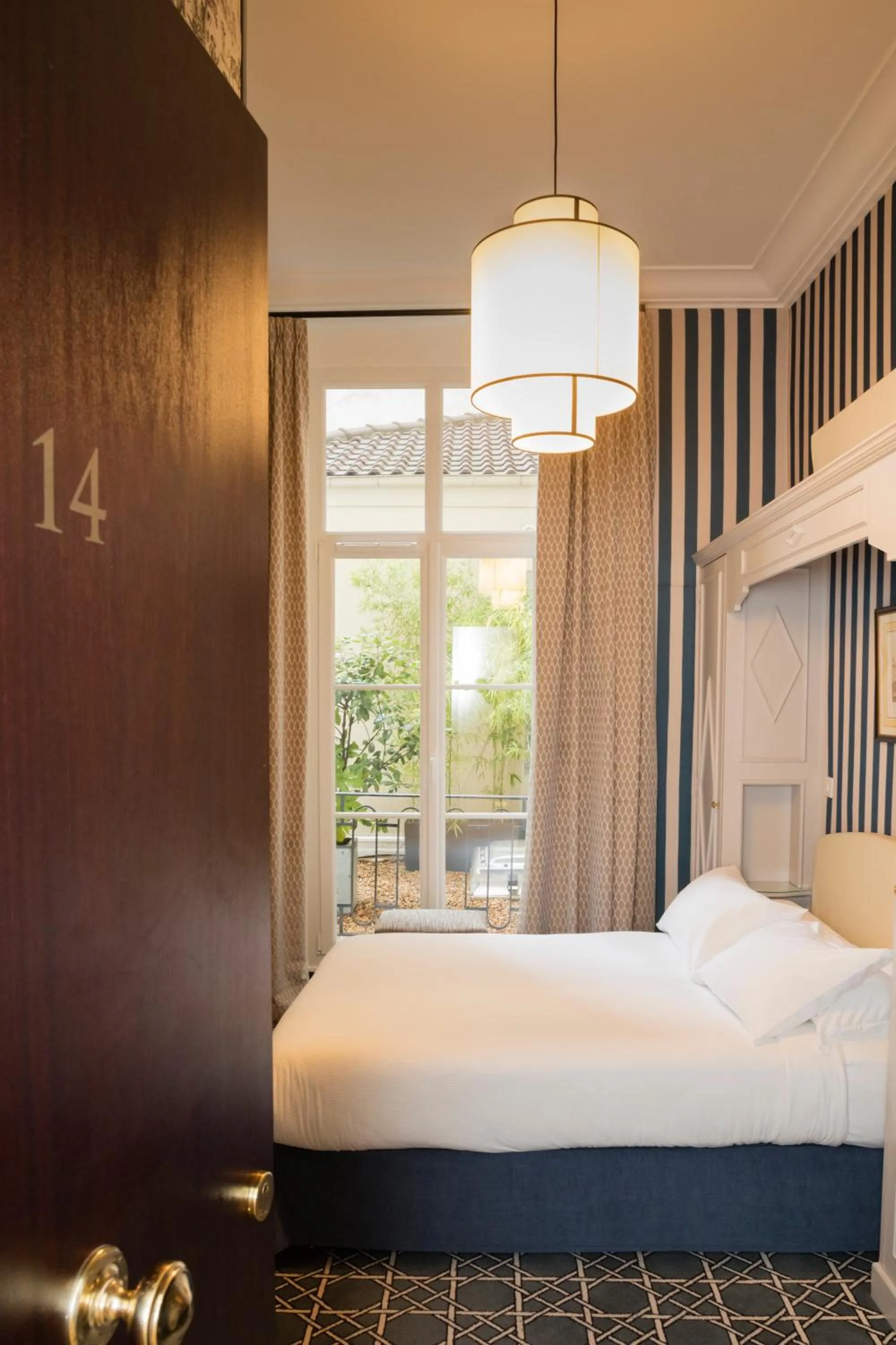 Photo of the whole room, Bed in Hôtel Saint Germain