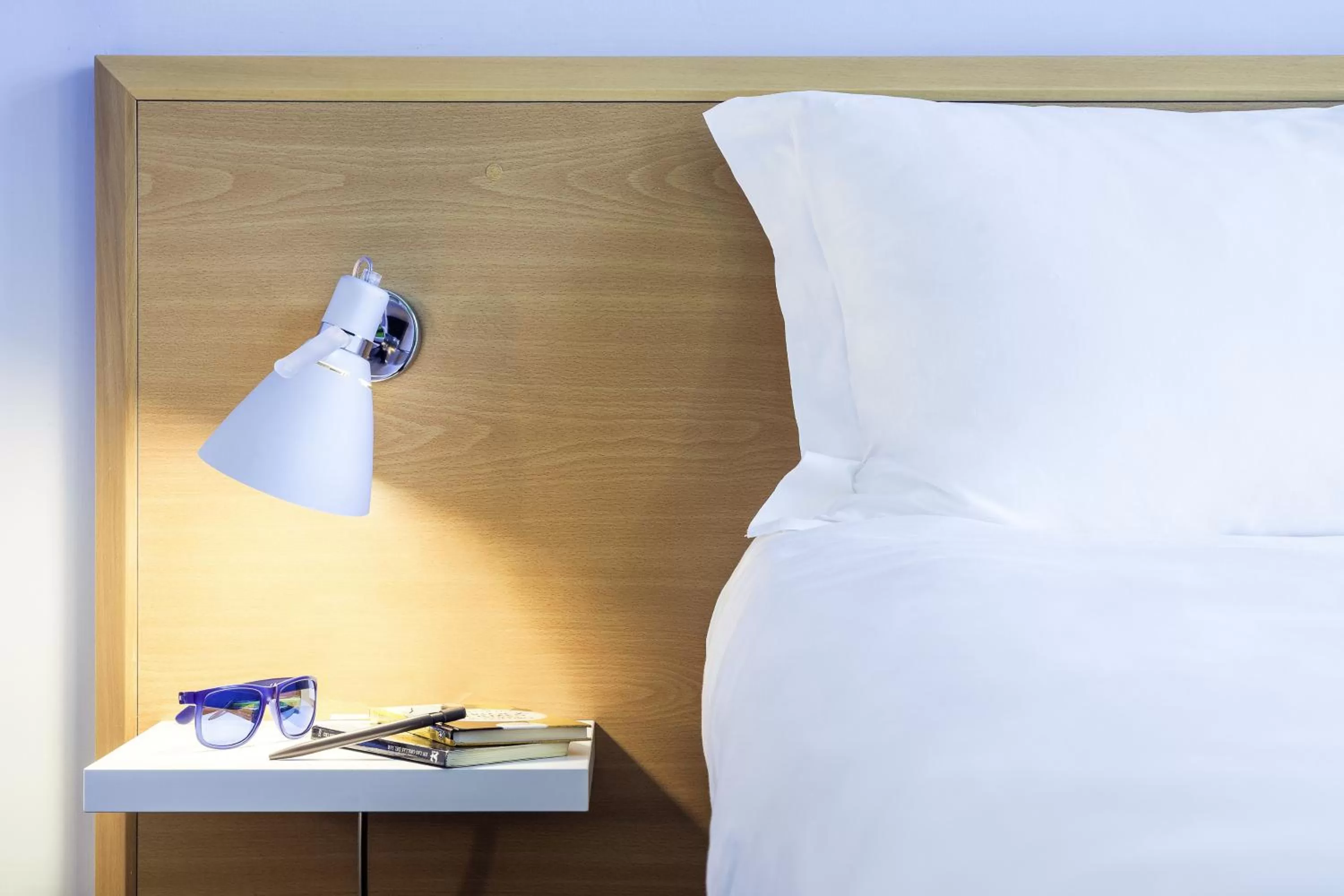 Decorative detail, Bed in Ibis Styles Napoli Garibaldi