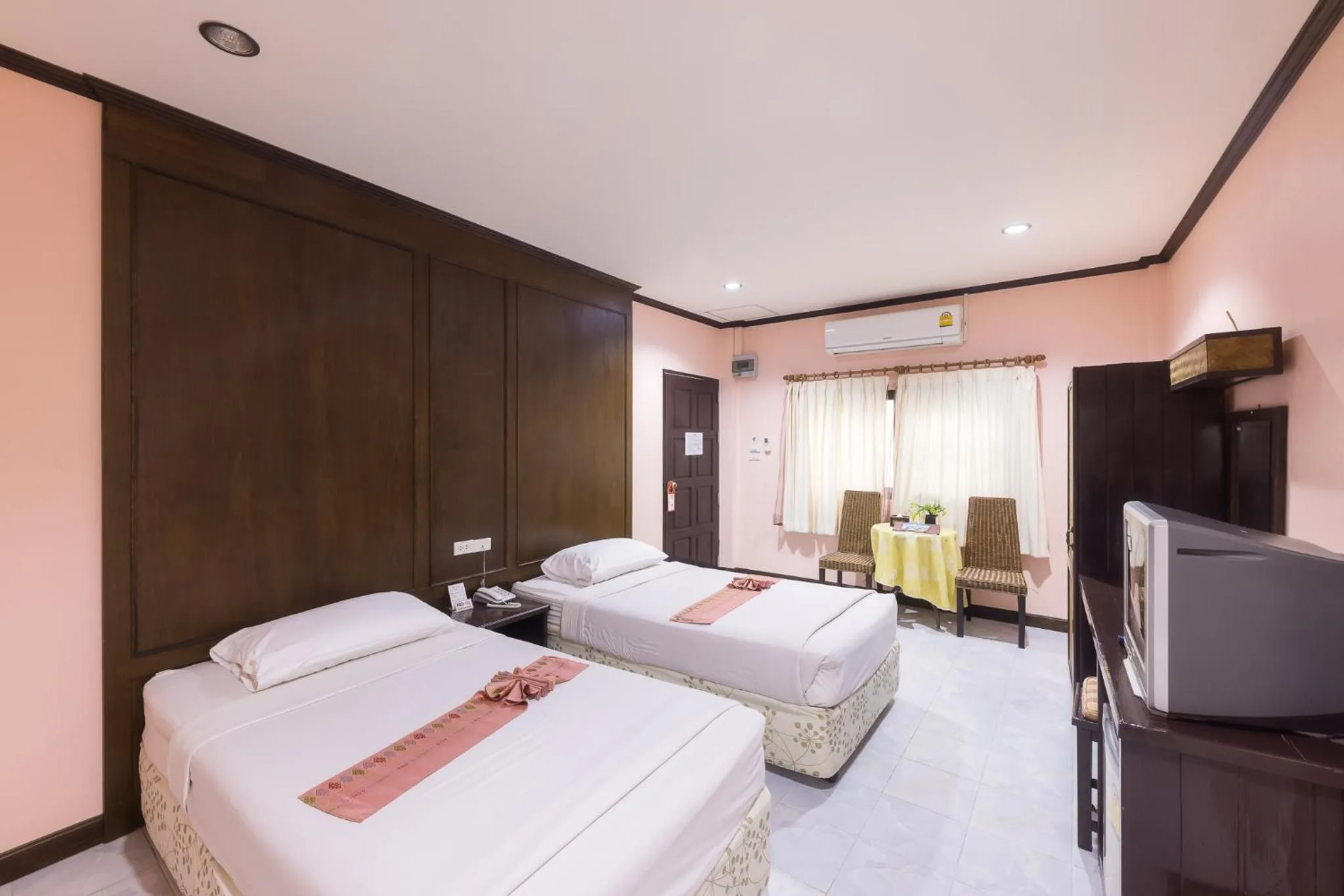 Bed in Silamanee Resort & Spa Hotel