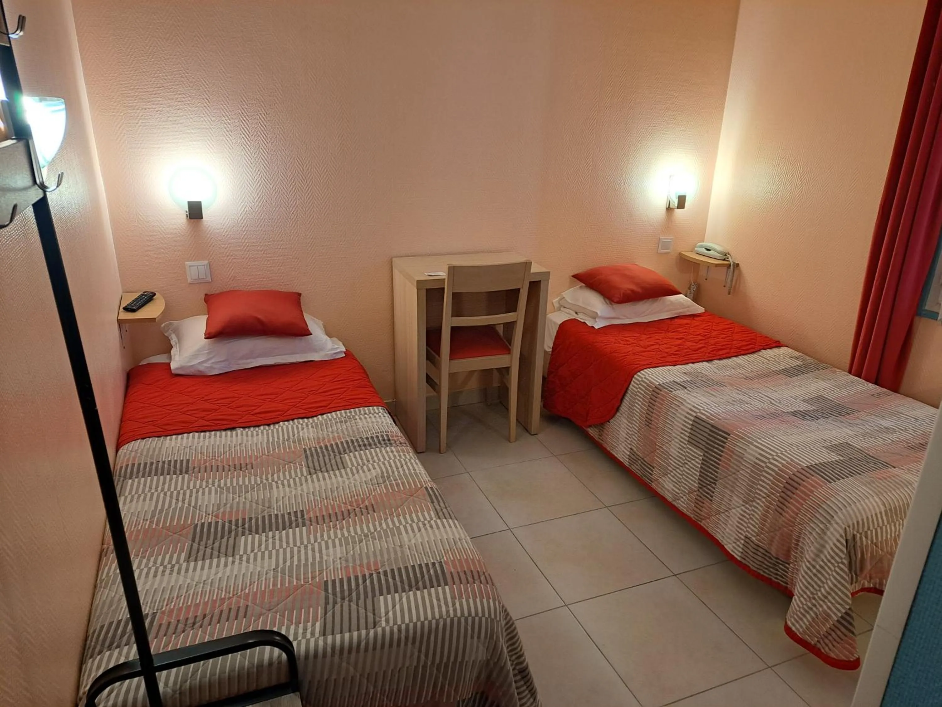 Bed in Hôtel Beauséjour