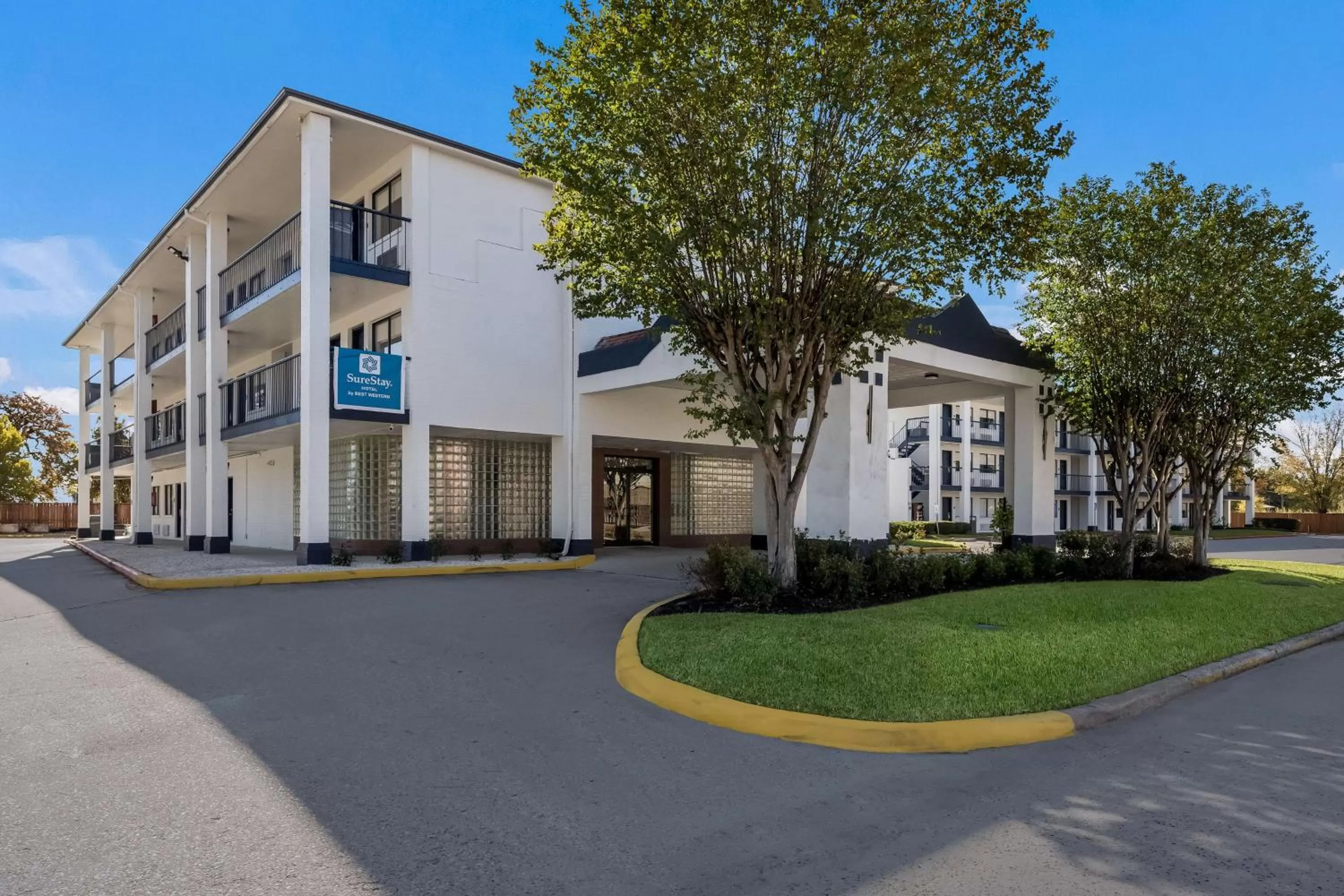 Property building in SureStay Hotel by Best Western Spring North Houston