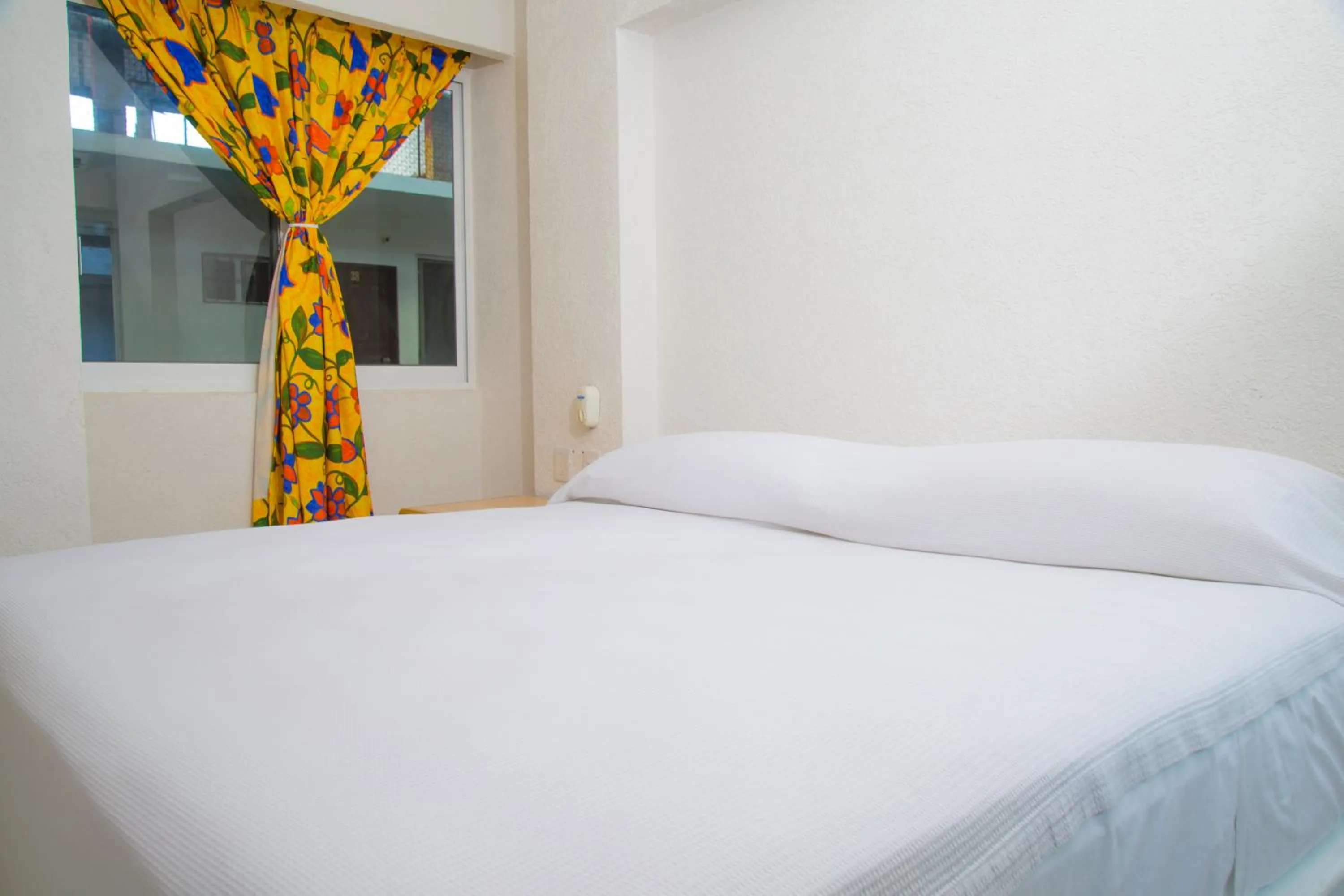 Bed in Hotel Acapulco