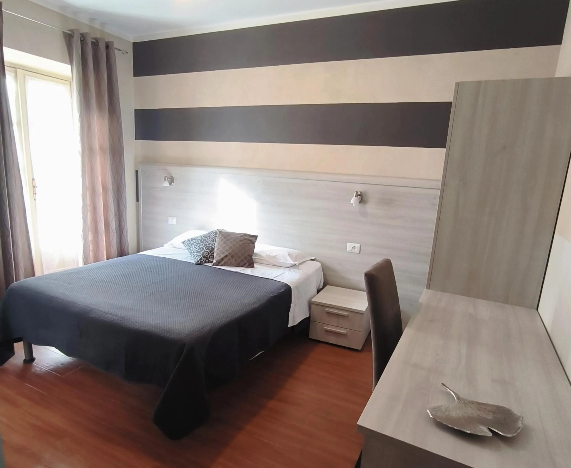 Photo of the whole room, Bed in Nuovo Hotel Giardini