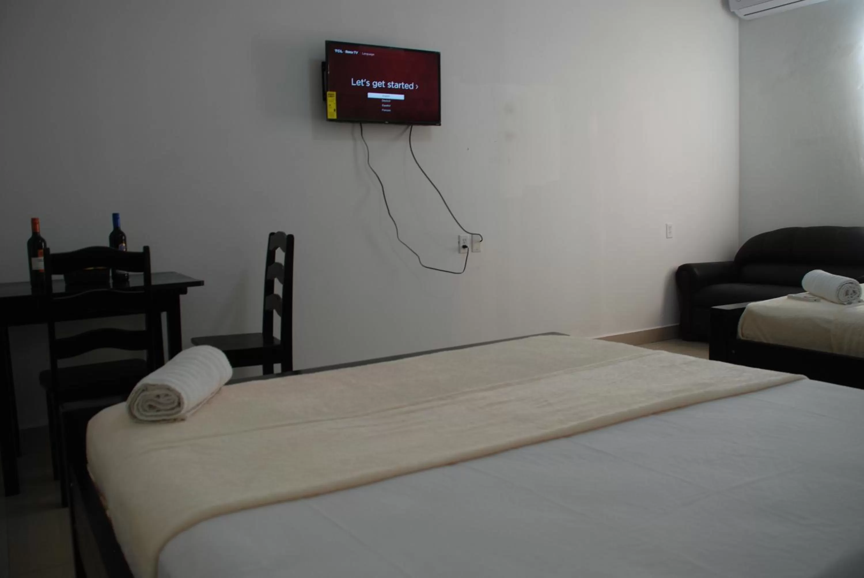 Bed in Hotel Coastalbay 2 & Golf Cart Rental