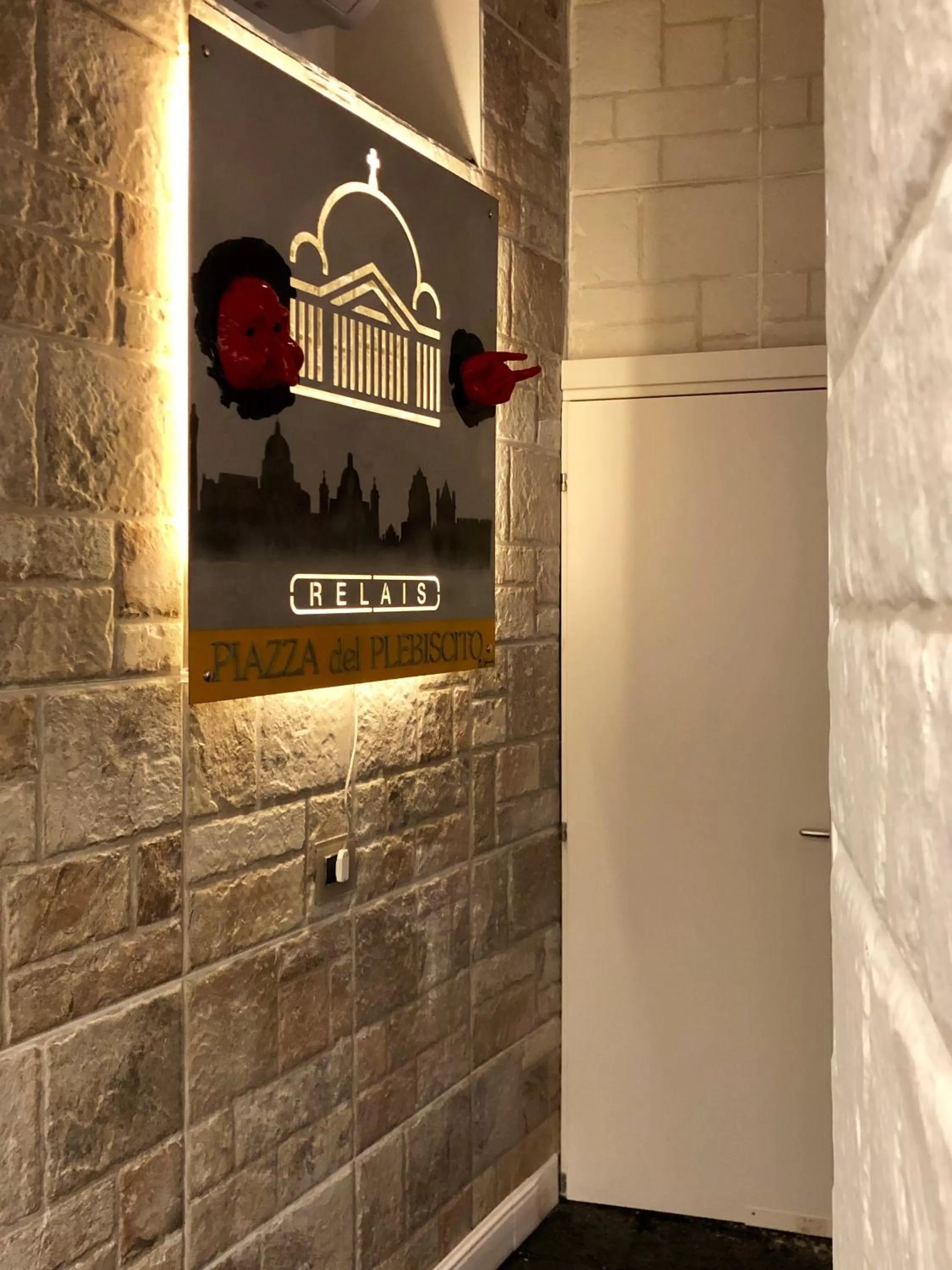 Property logo or sign in Relais Piazza Del Plebiscito B&B