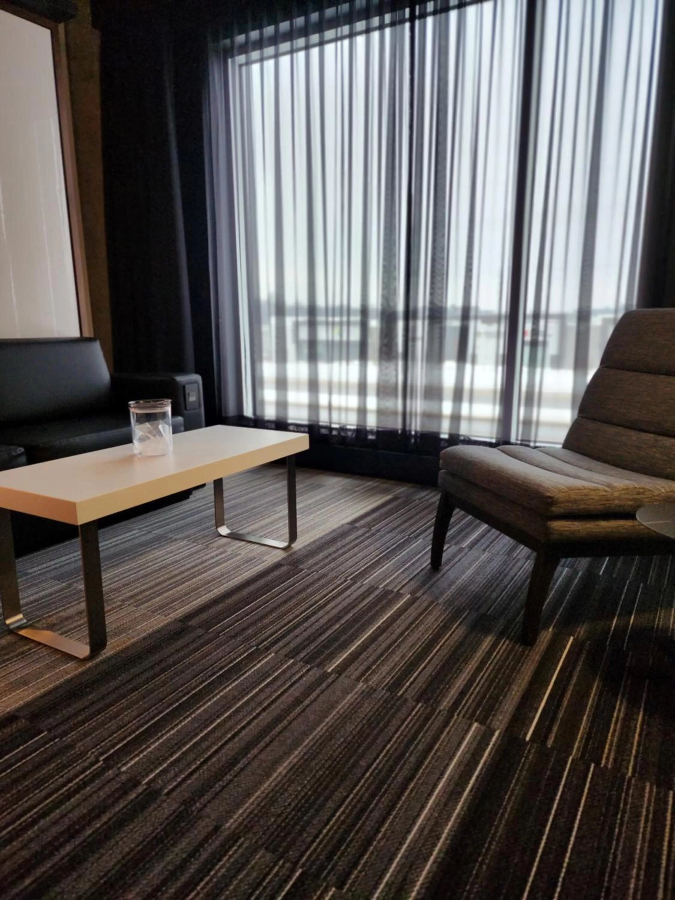 Seating area in Grand Hotel TiMES Blainville-Mirabel