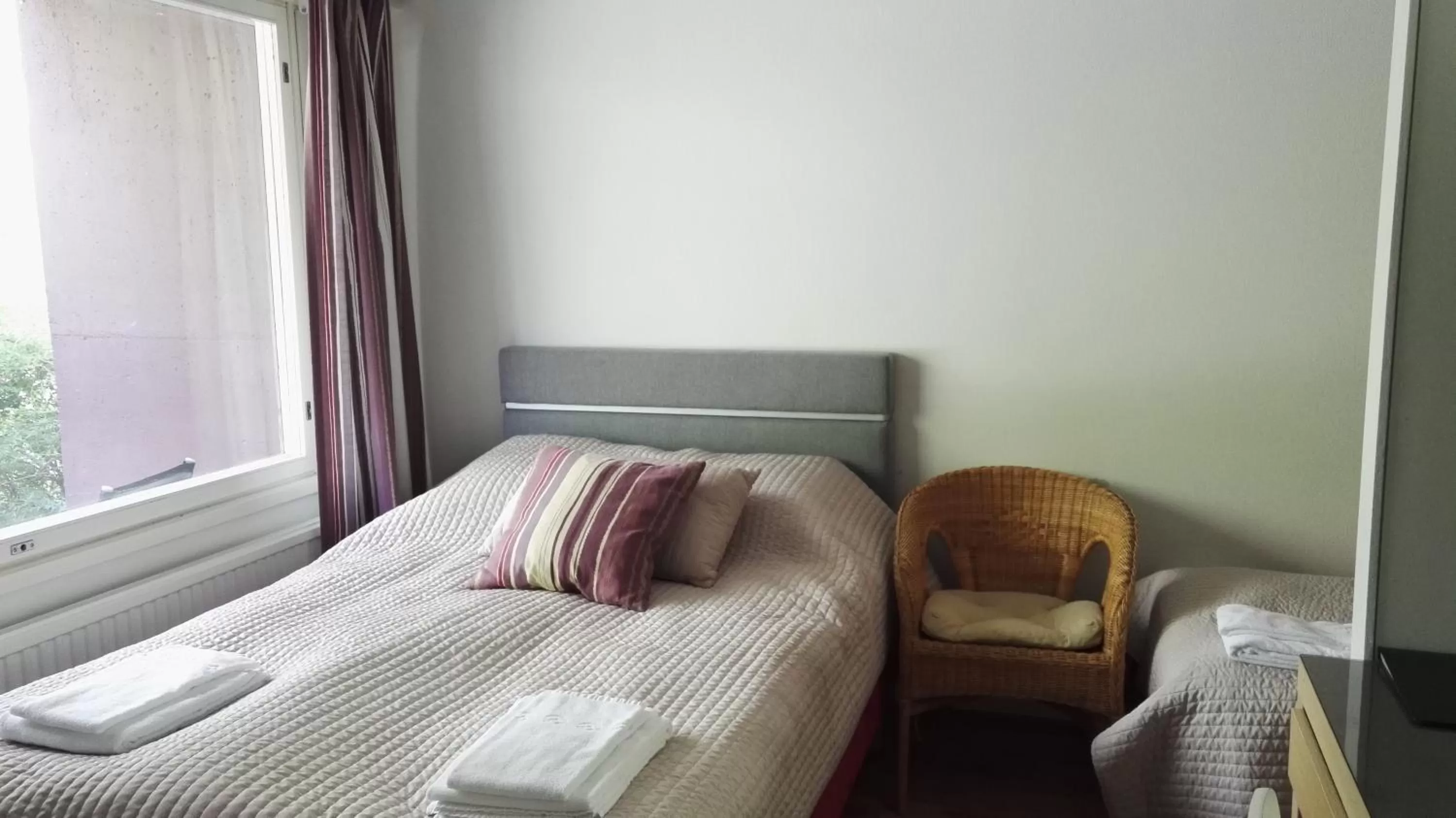 Bed in Revontuli Resort Rooms