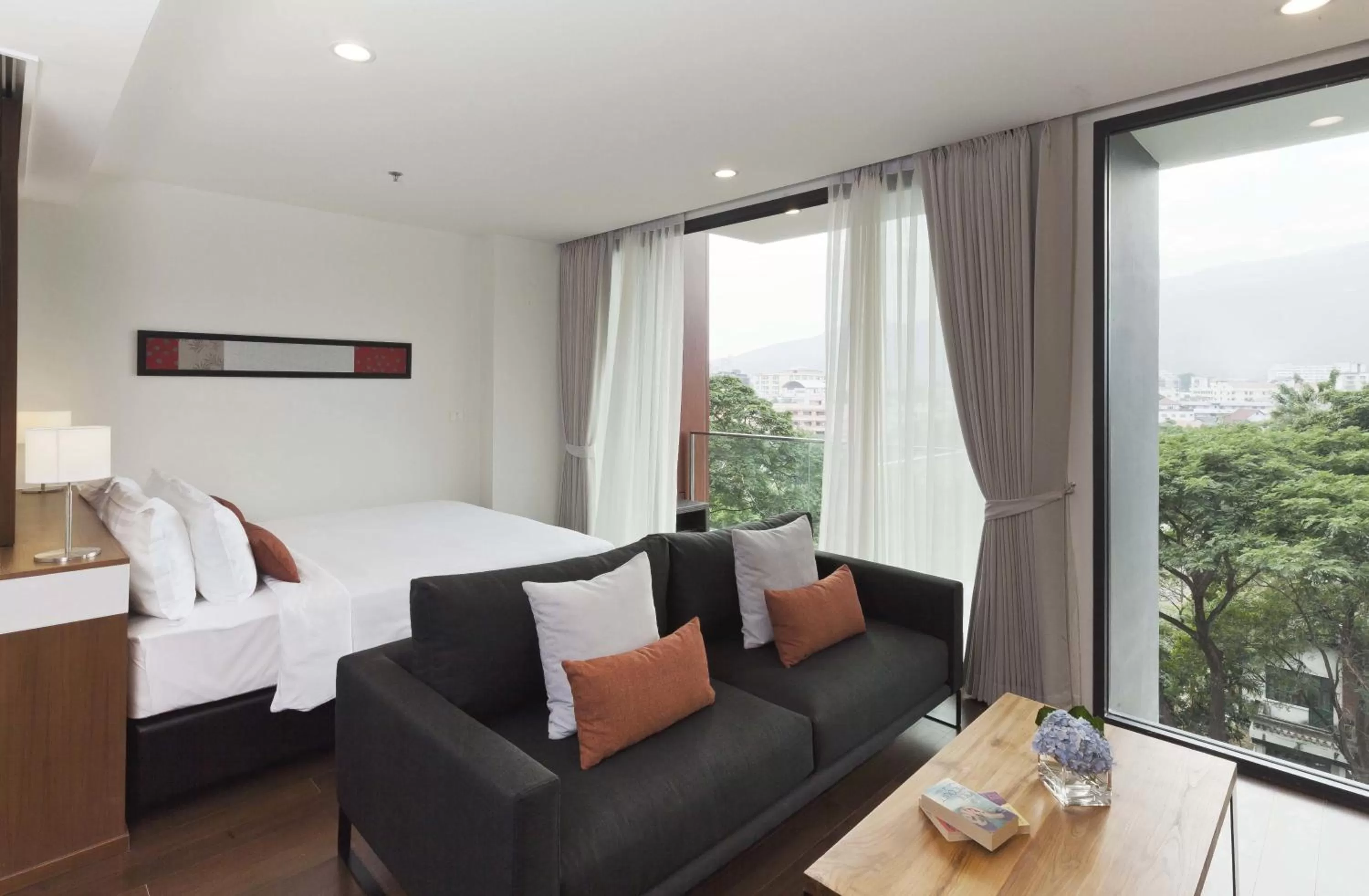 Living room, Bed in Eastin Tan Hotel Chiang Mai