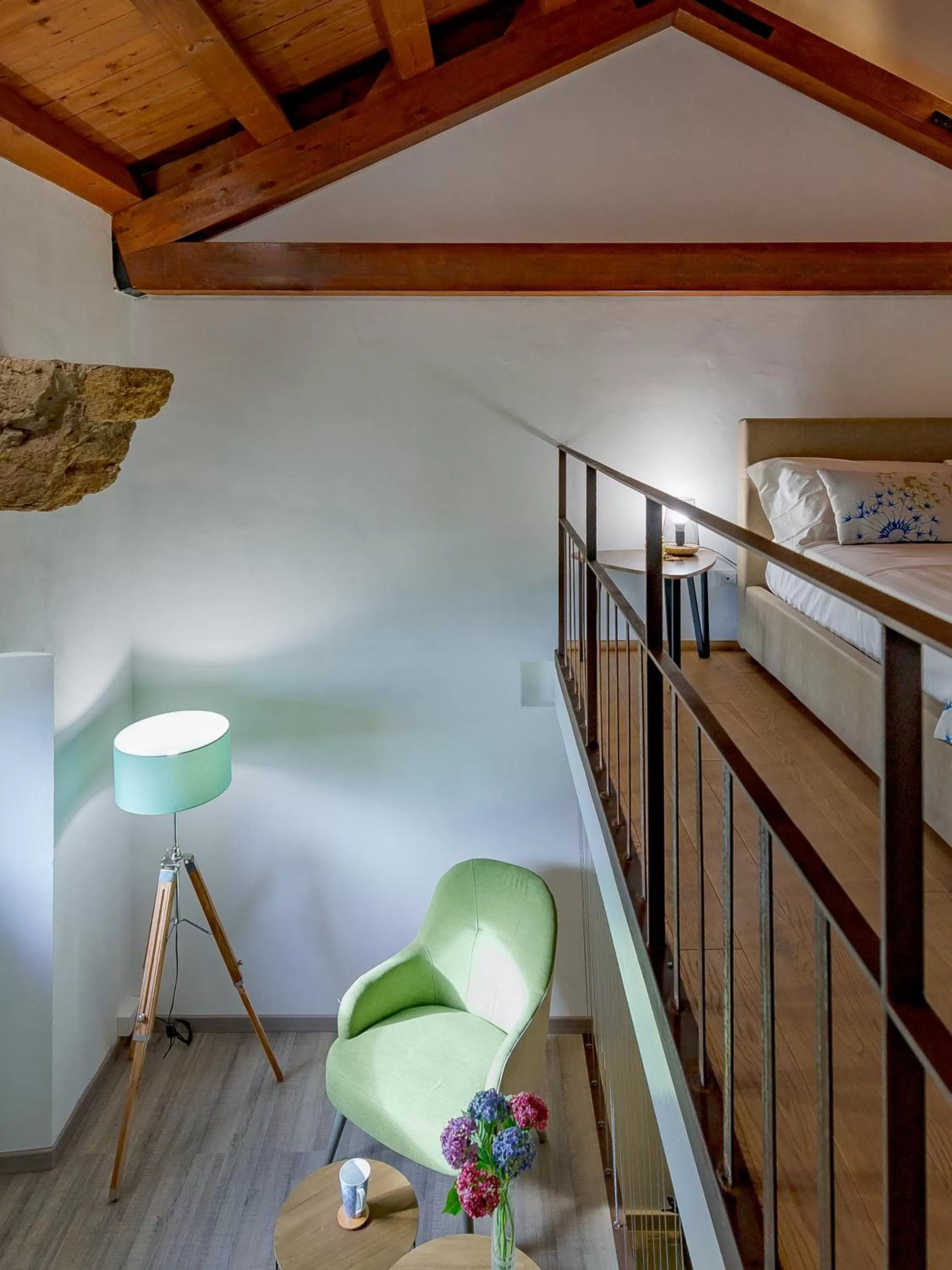 Bed in Le Maestranze Deluxe Rooms