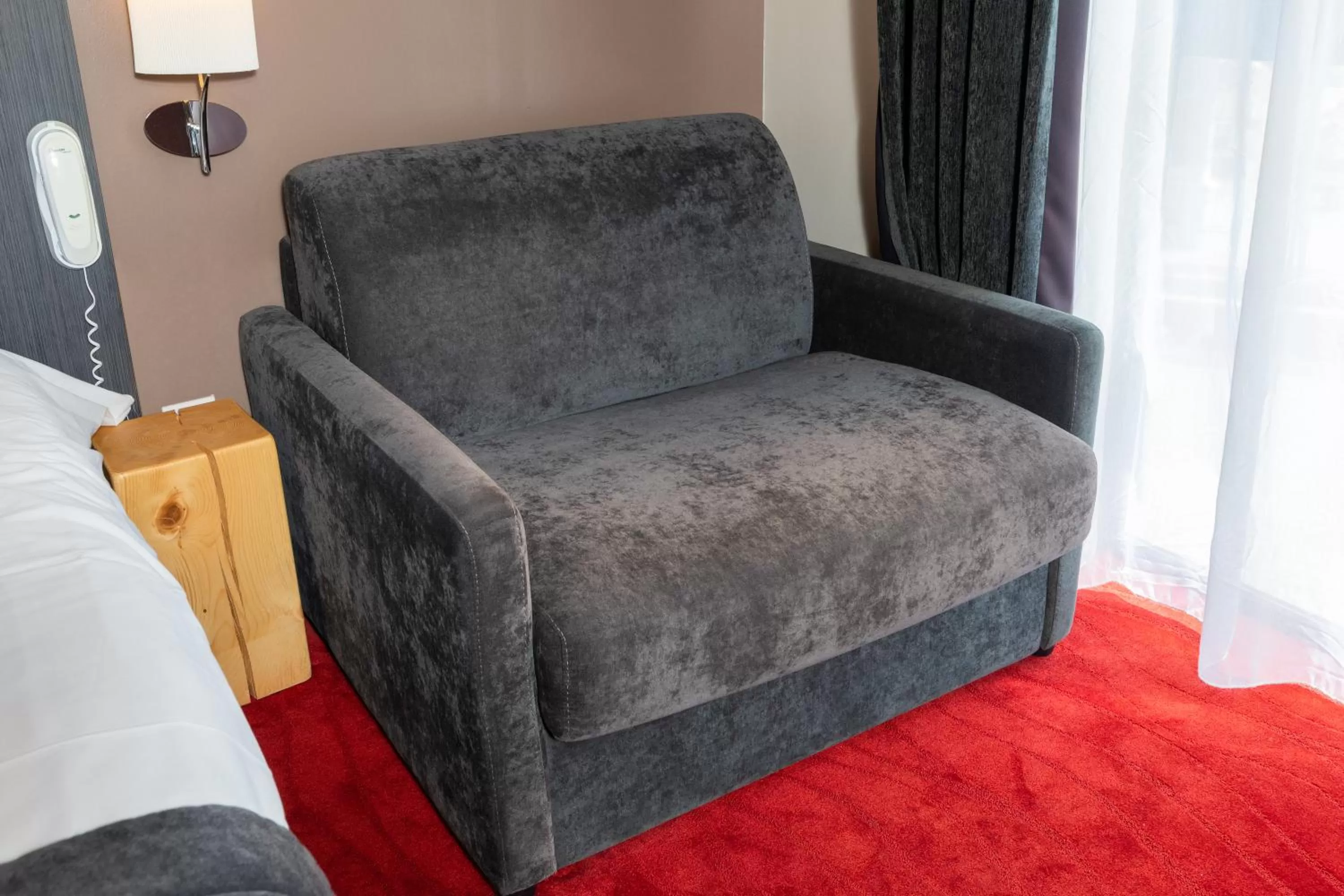 Bed in SOWELL HOTELS Le Parc & Spa