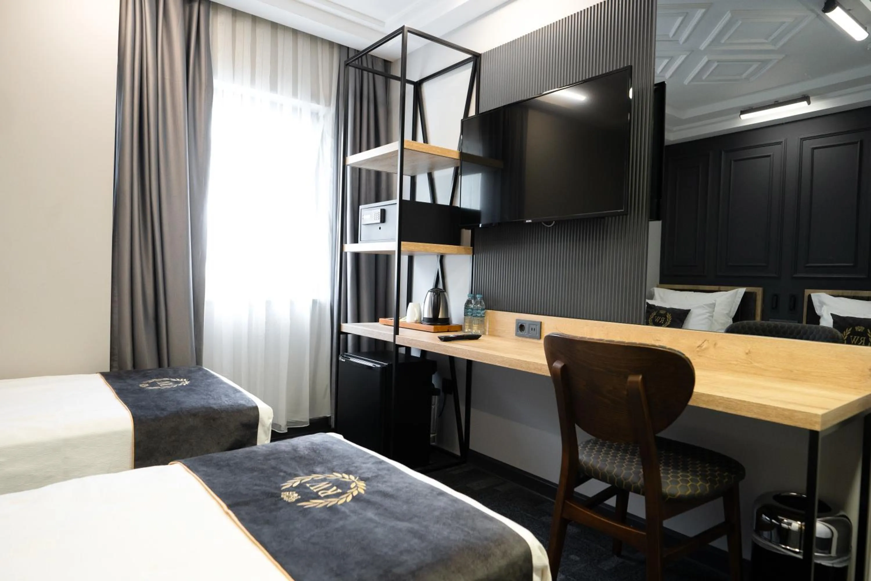 Bed in RW BOUTIQUE HOTEL