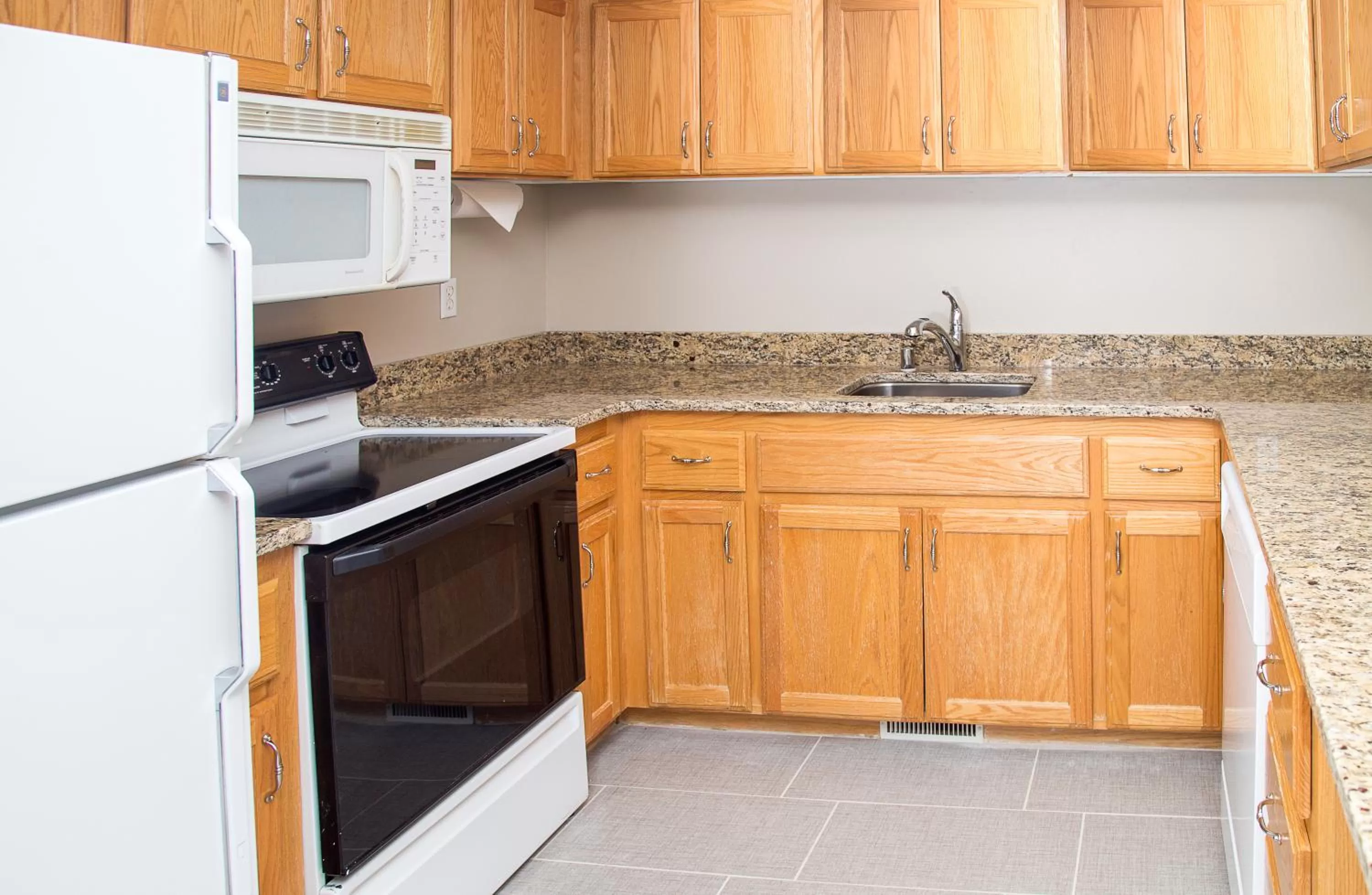 Kitchen or kitchenette in Gray Wolf Inn & Suites