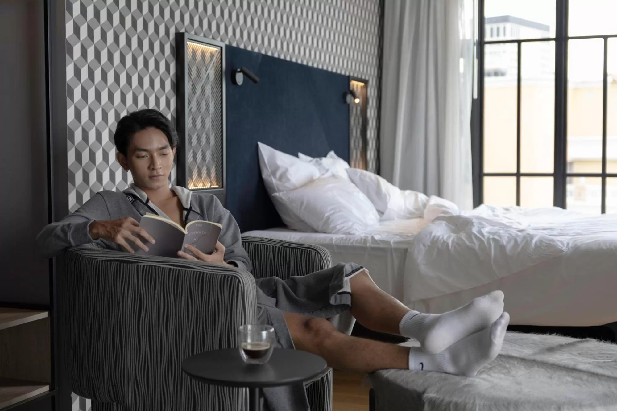 Bed in TRIBE Phnom Penh Post Office