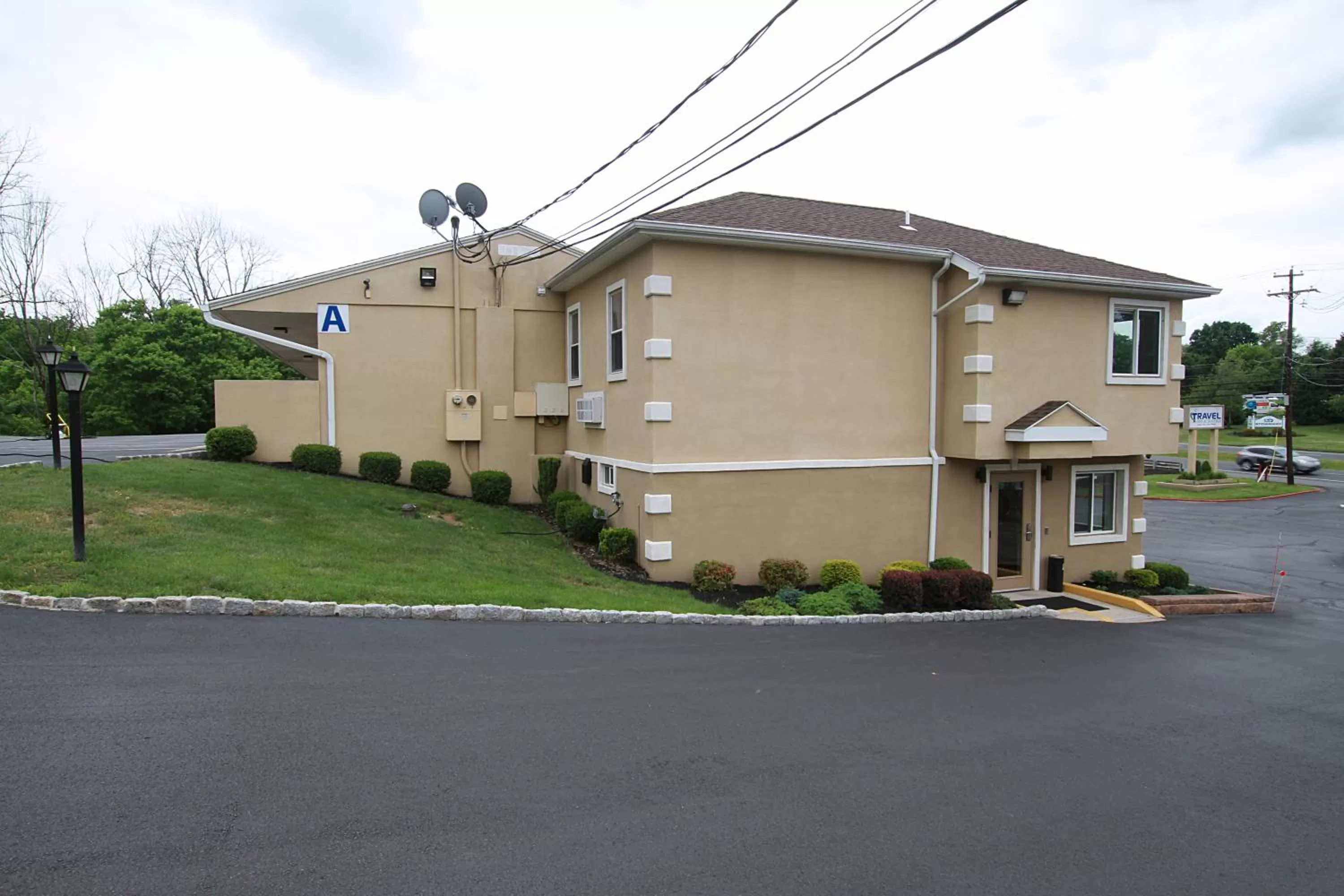 Property building in Travel Inn & Suites Flemington