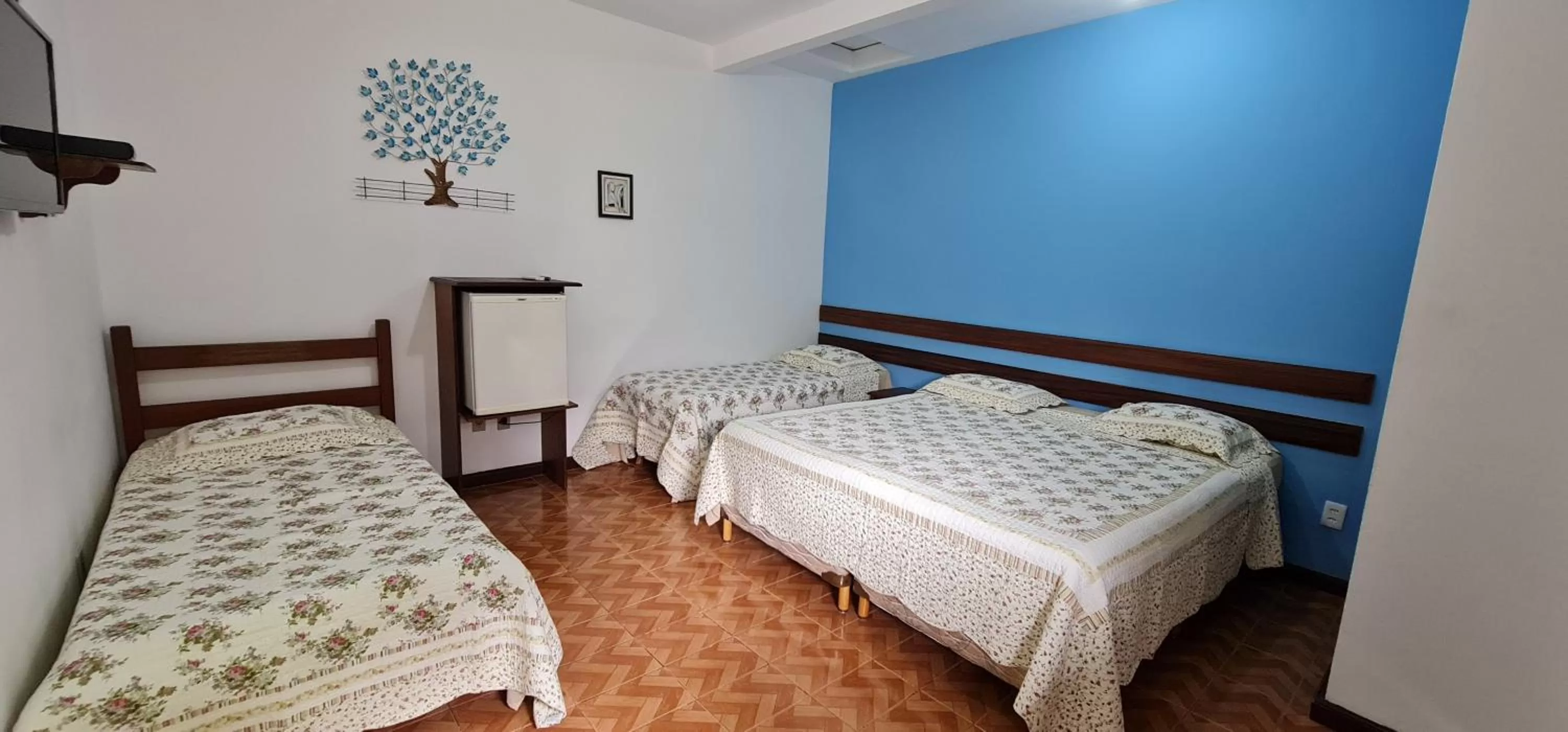 Bed in Pousada Flor de Paraty