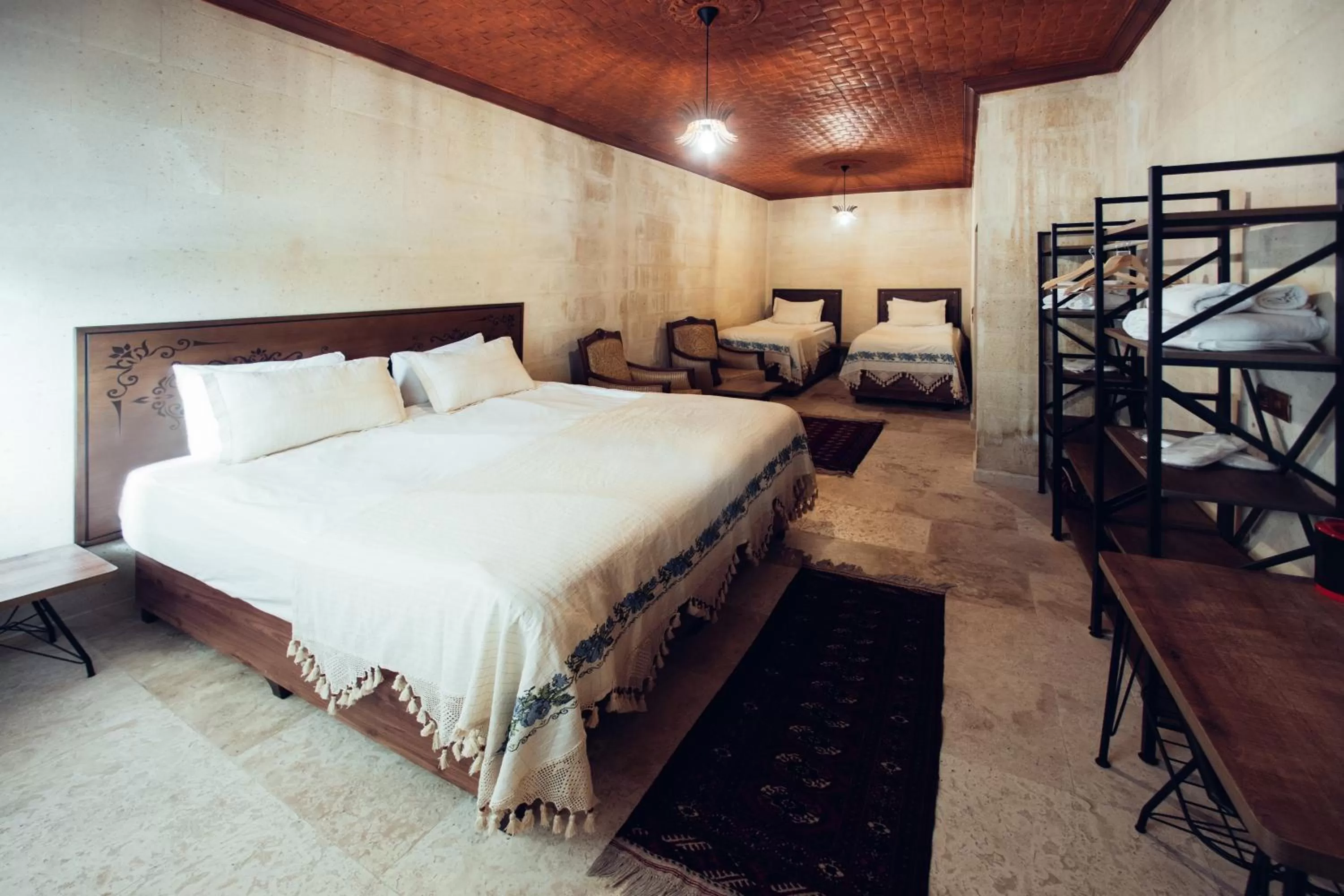 Bed in Azalea Terrace Cave Hotel