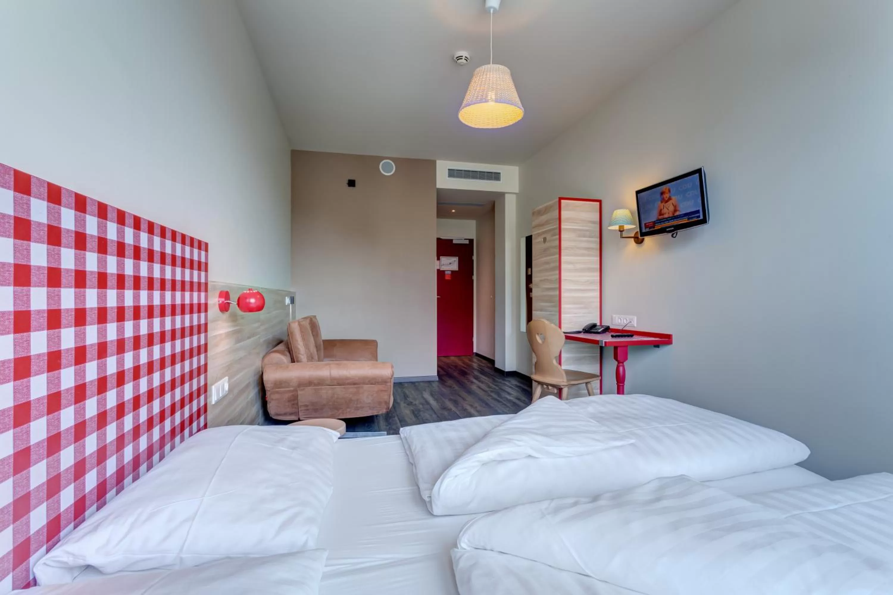 Photo of the whole room, Bed in MEININGER Hotel Salzburg City Center