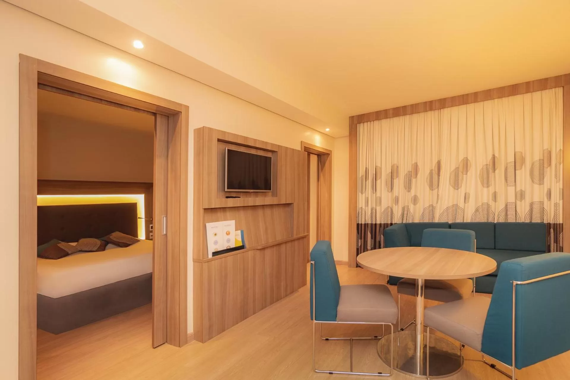 Living room, Bed in Novotel Campo Grande