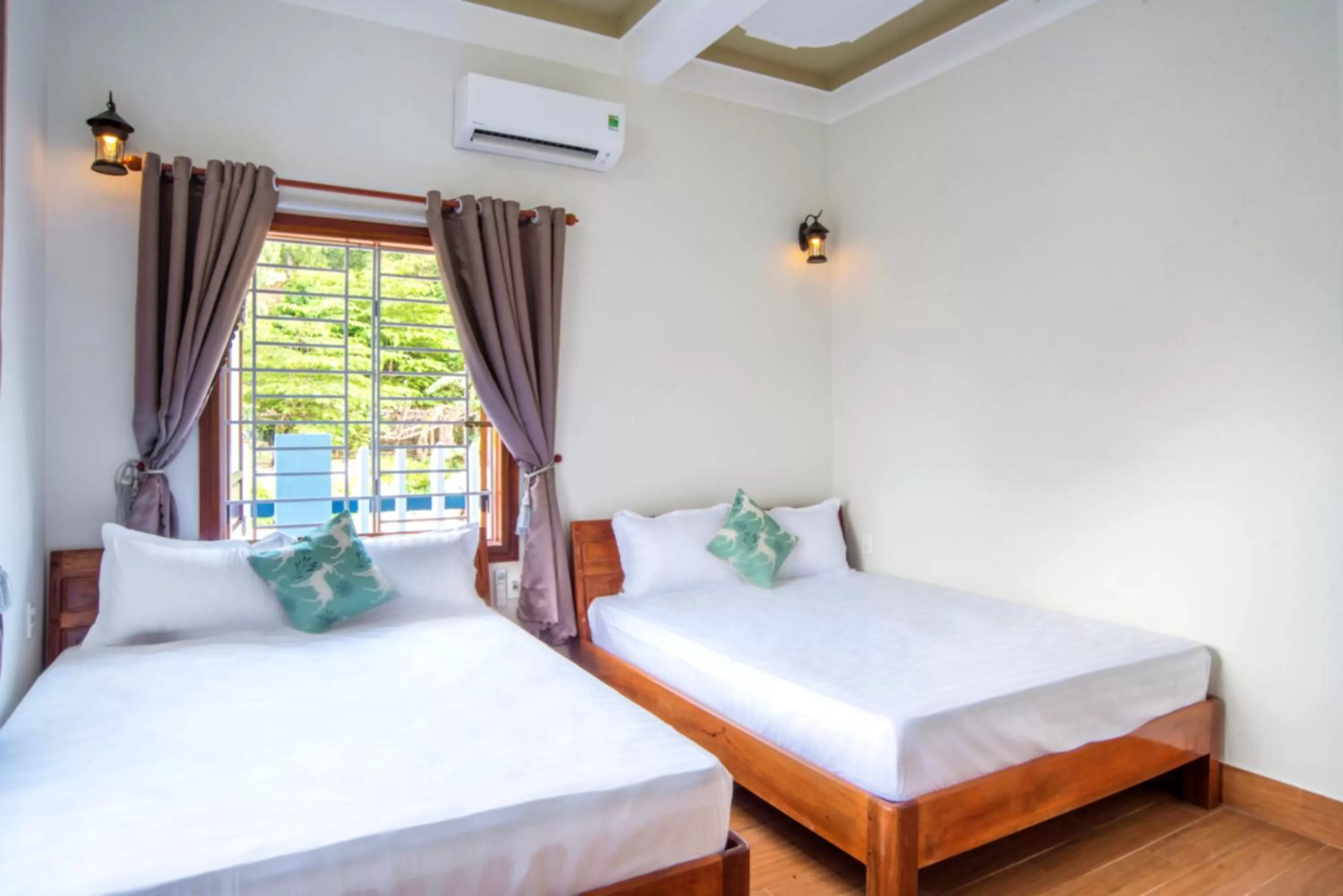 Bed in Cong Man Homestay Cham Island