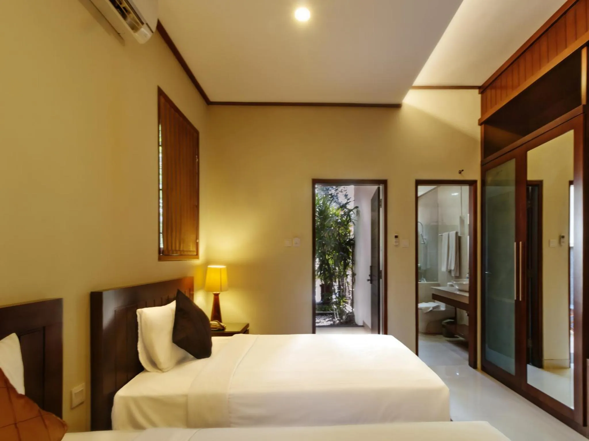 Photo of the whole room, Bed in Yulia Beach Inn Kuta