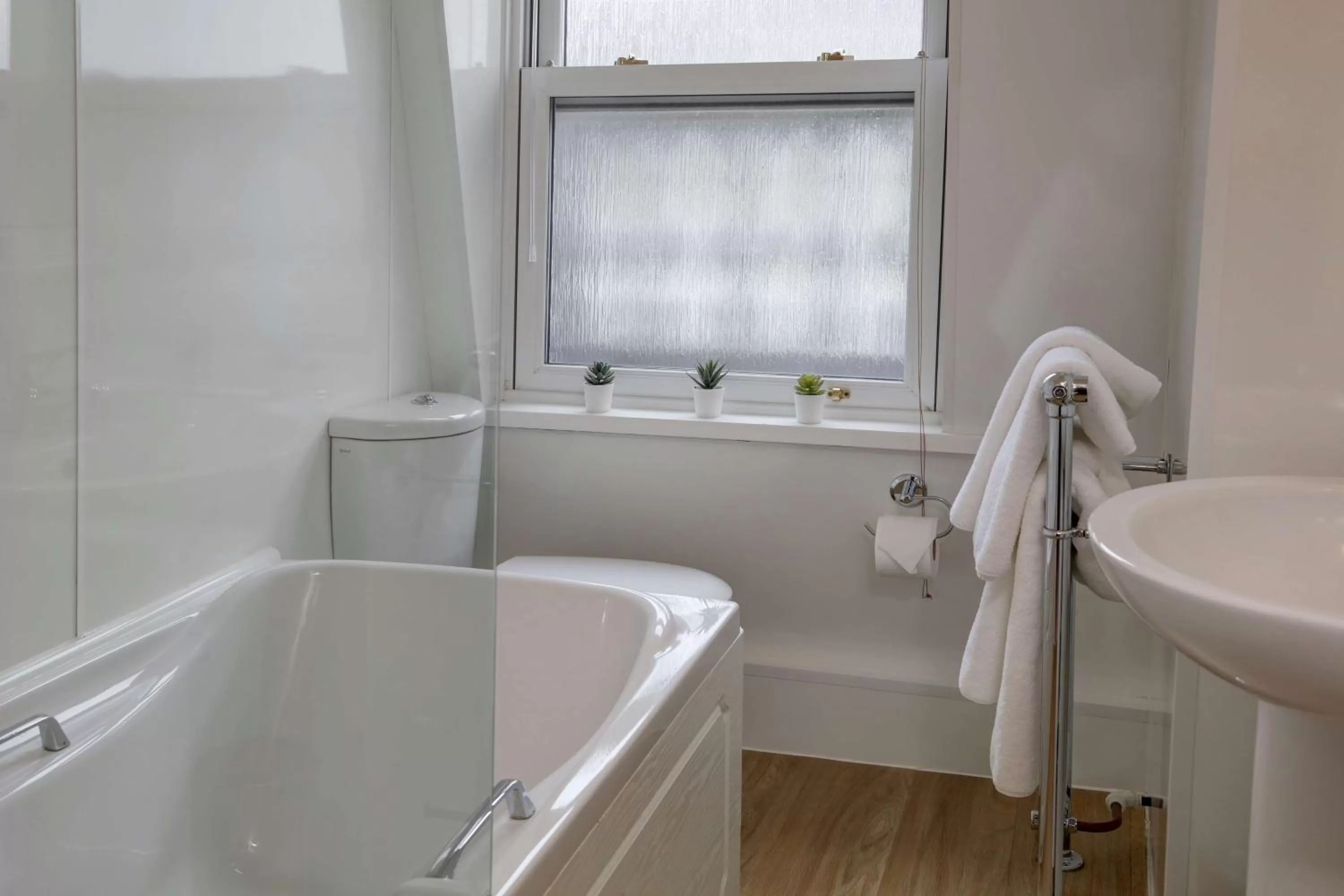 Bedroom in New Continental Hotel; Sure Hotel Collection by Best Western