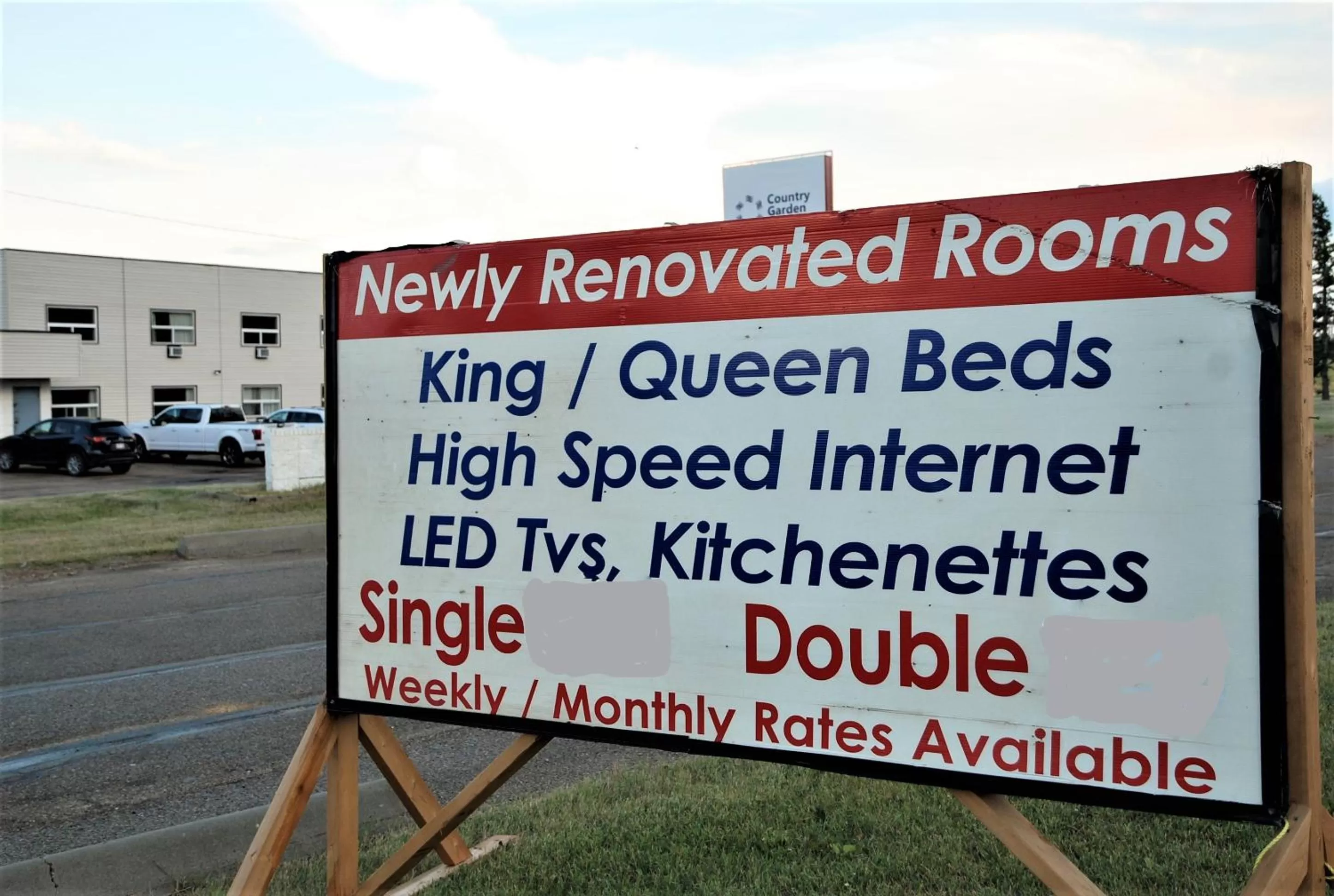 Property logo or sign in Country Garden Inn & Restaurant