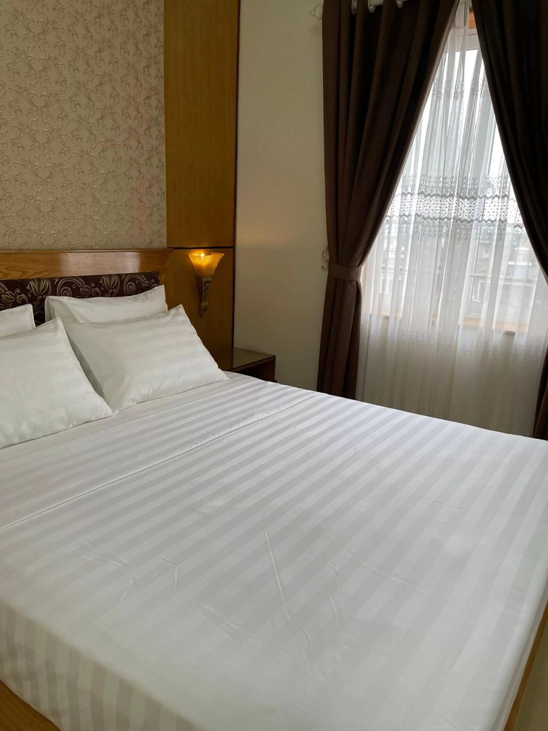Bed in Hoa Phuong Hotel