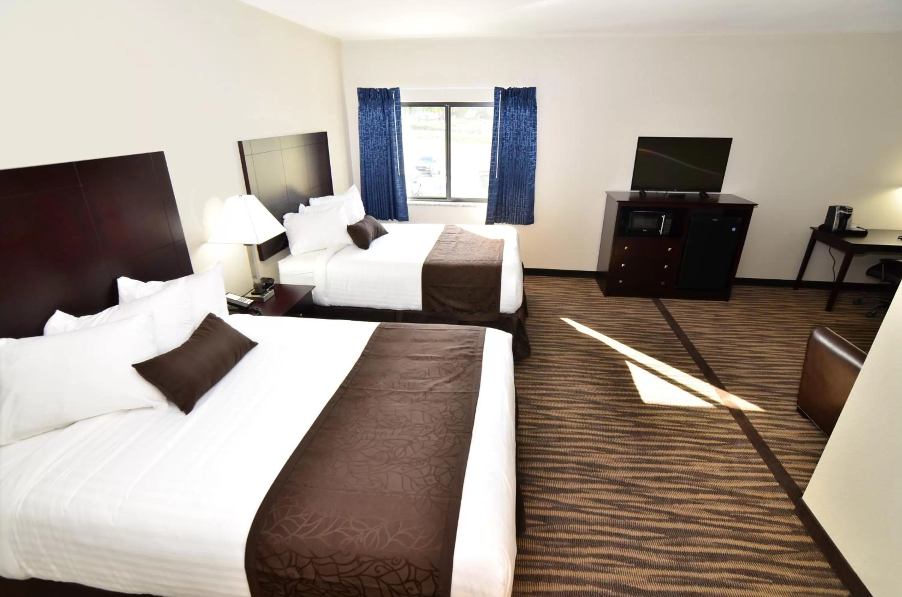 Bed in Cobblestone Inn & Suites - Manning