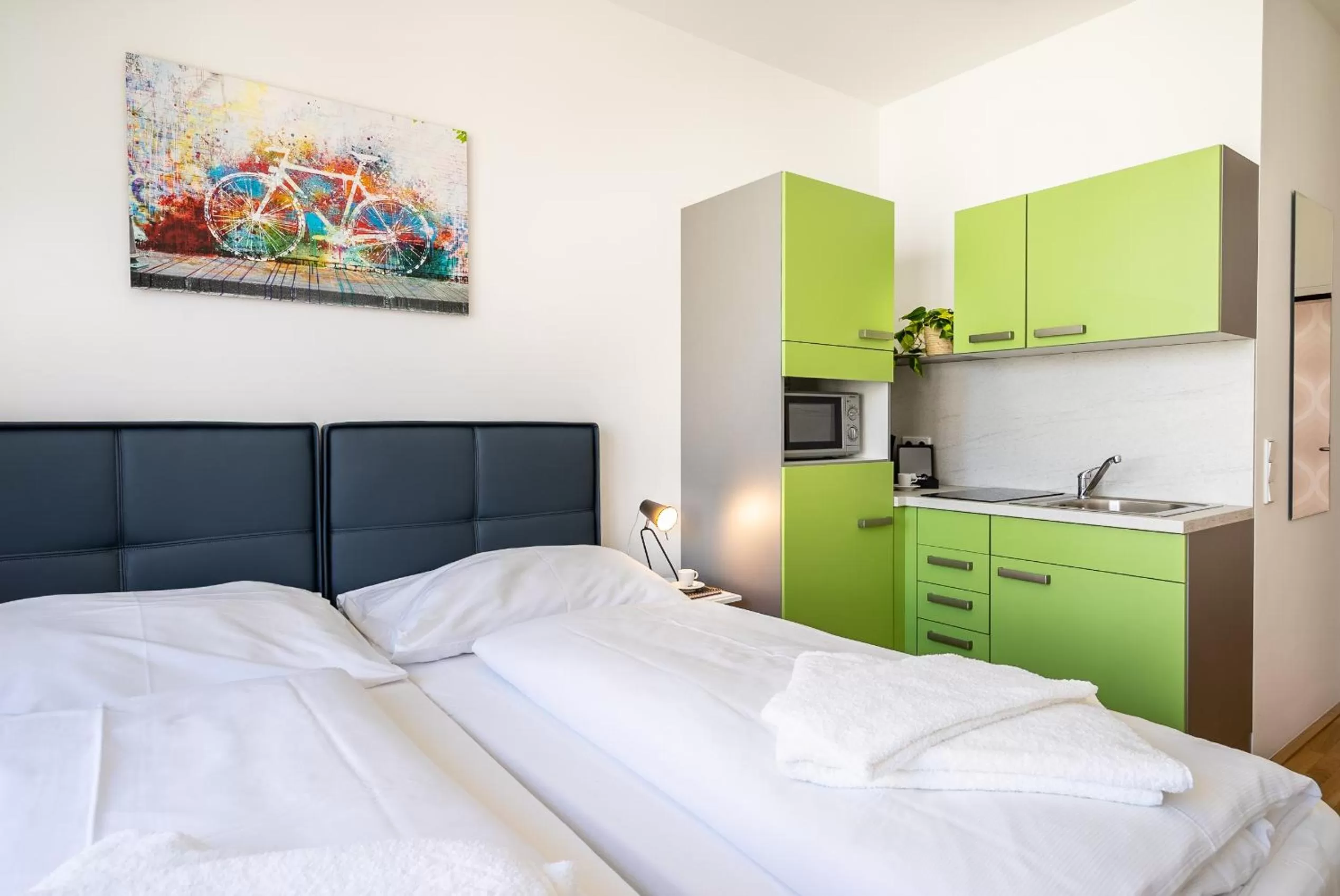 Bed in FeelGood Apartments SmartLiving | contactless check-in