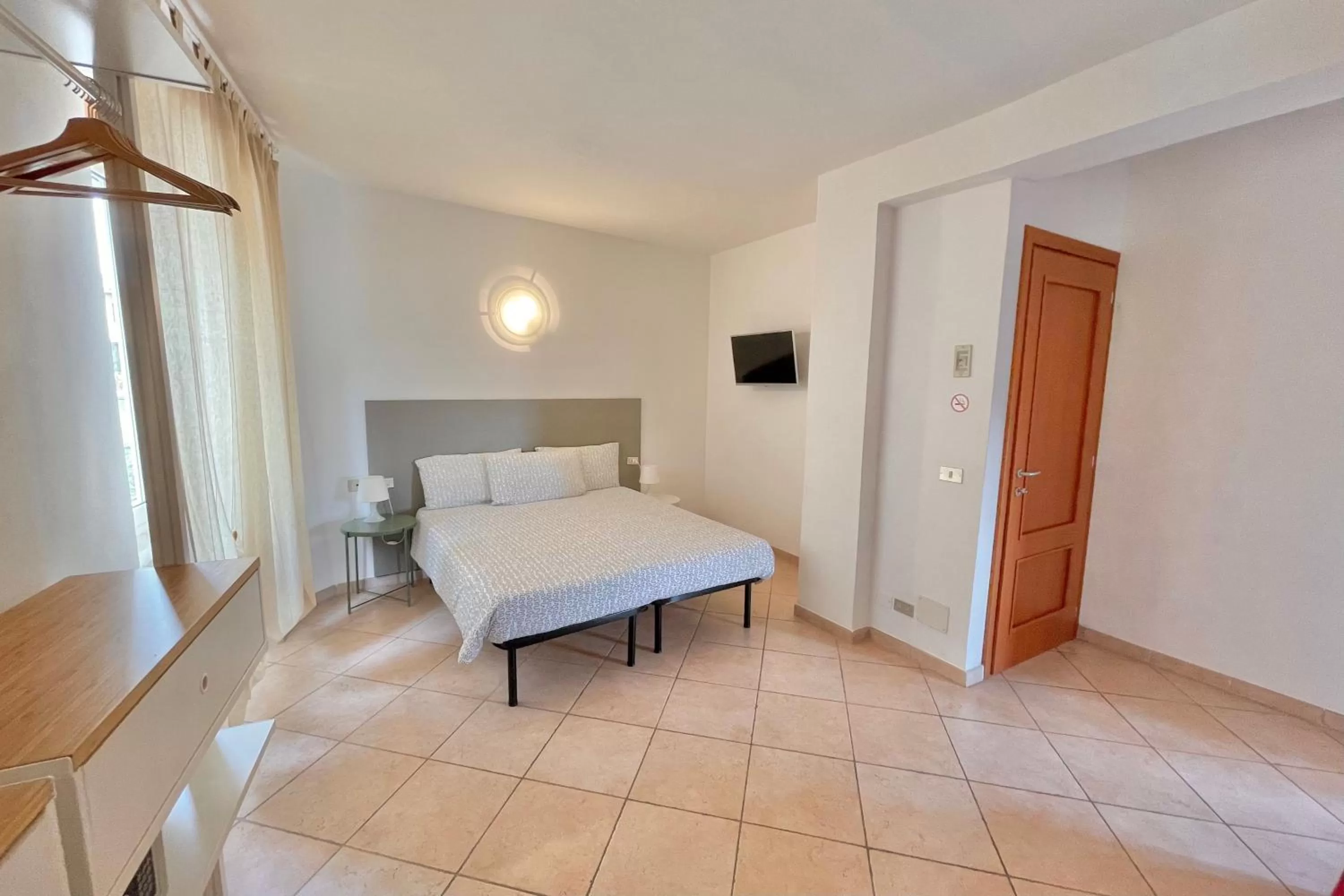 Photo of the whole room, Bed in Albergo Vittoria