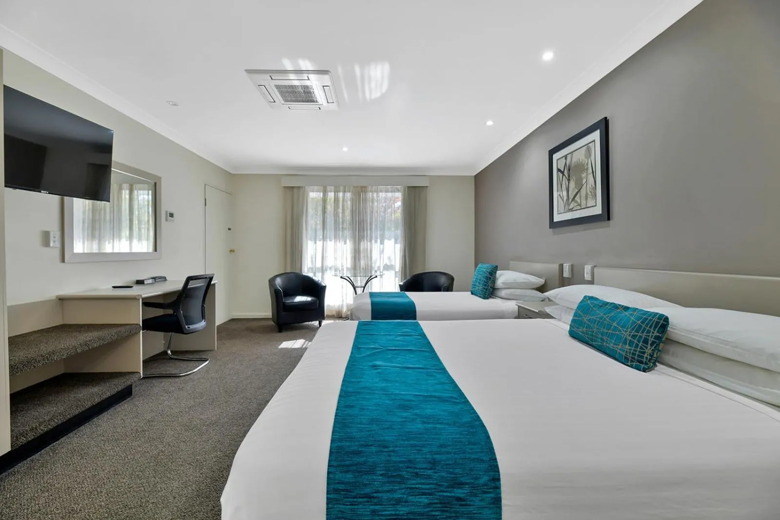 Bed in Central Caleula Motor Lodge