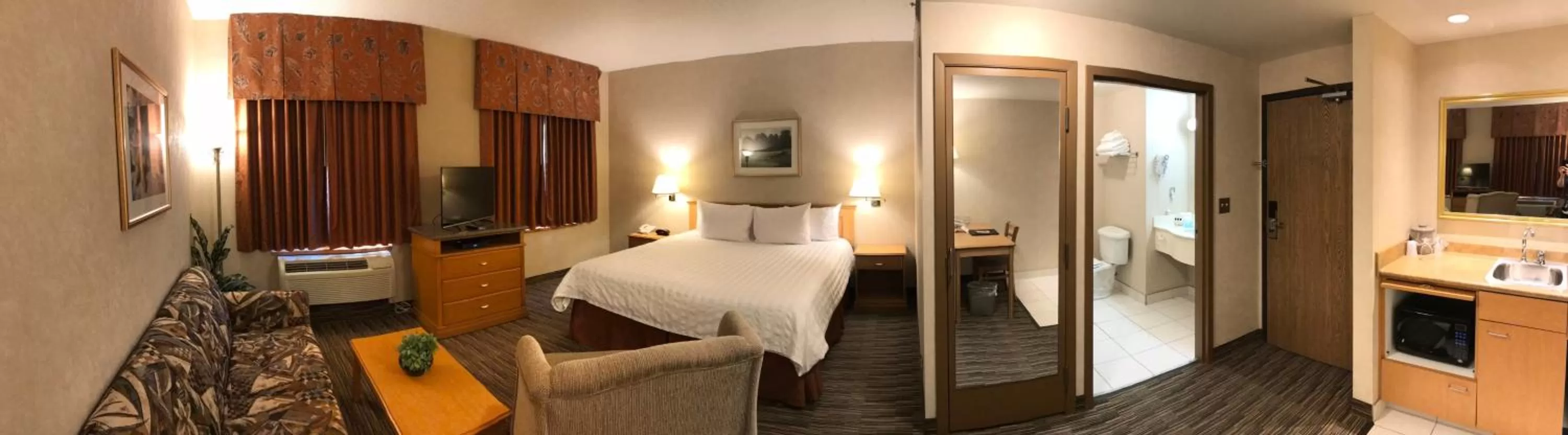 Bed in Humphry Inn and Suites