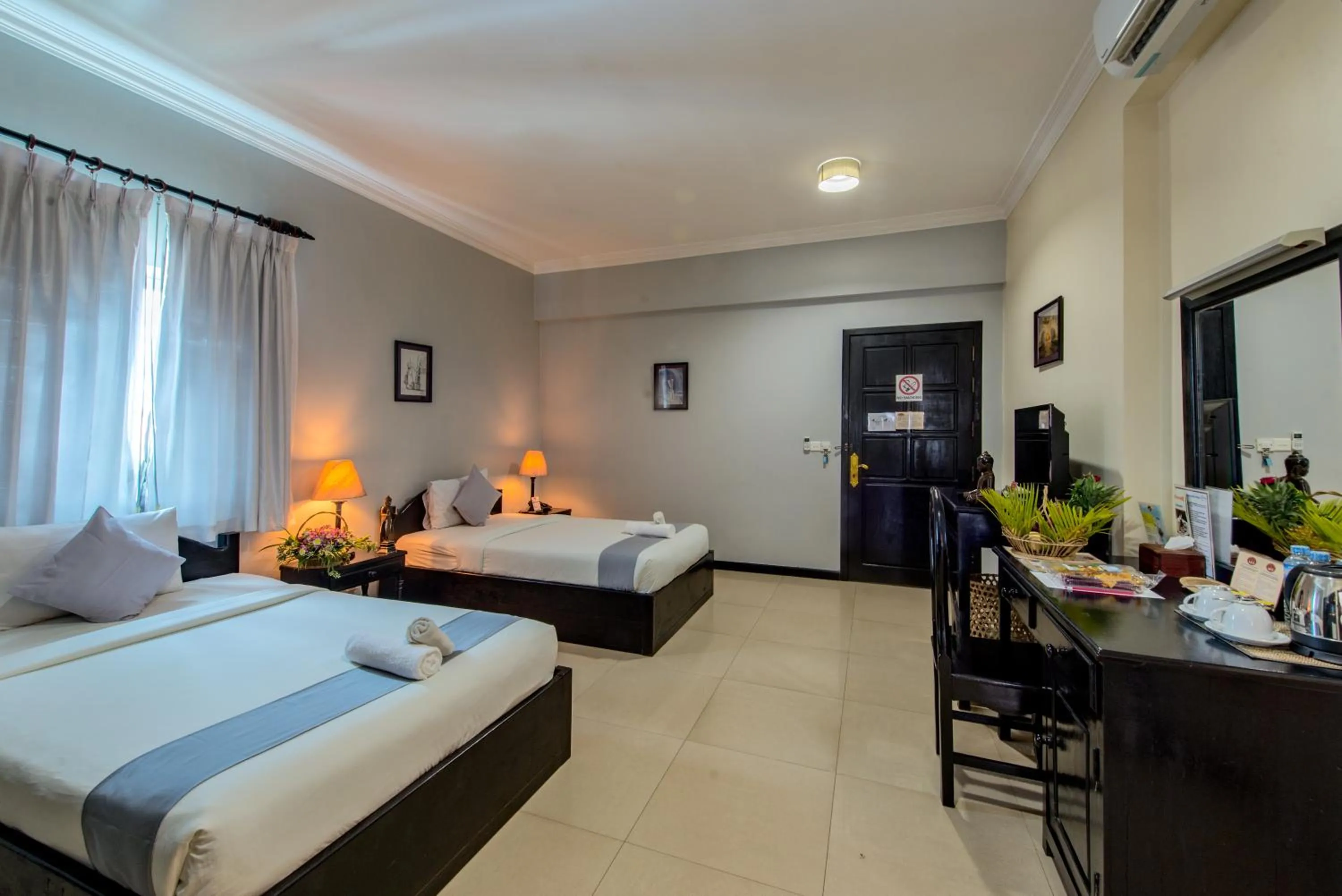 Photo of the whole room, Bed in Angkor Panoramic Boutique Hotel