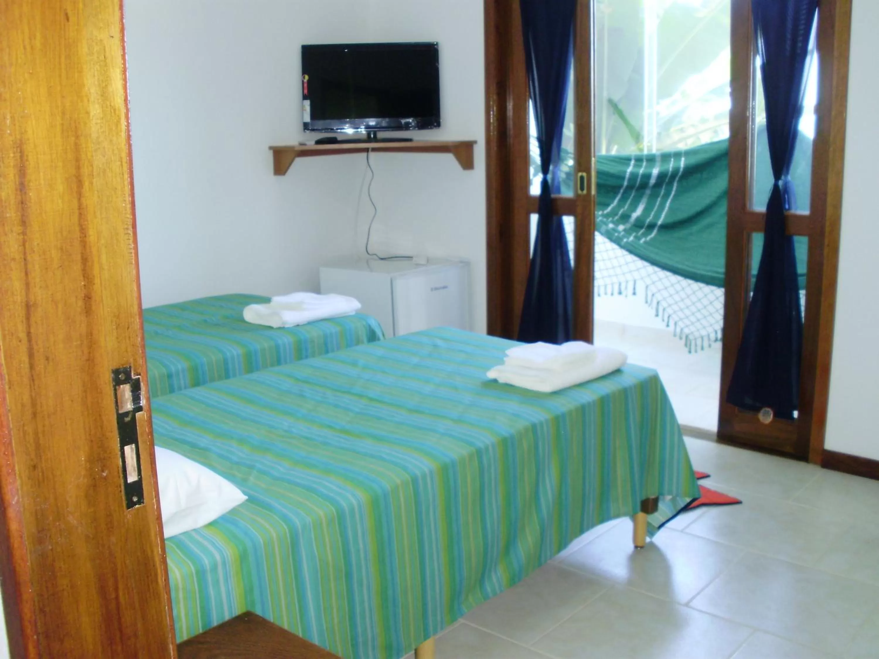 Photo of the whole room, Bed in Pousada Piquara