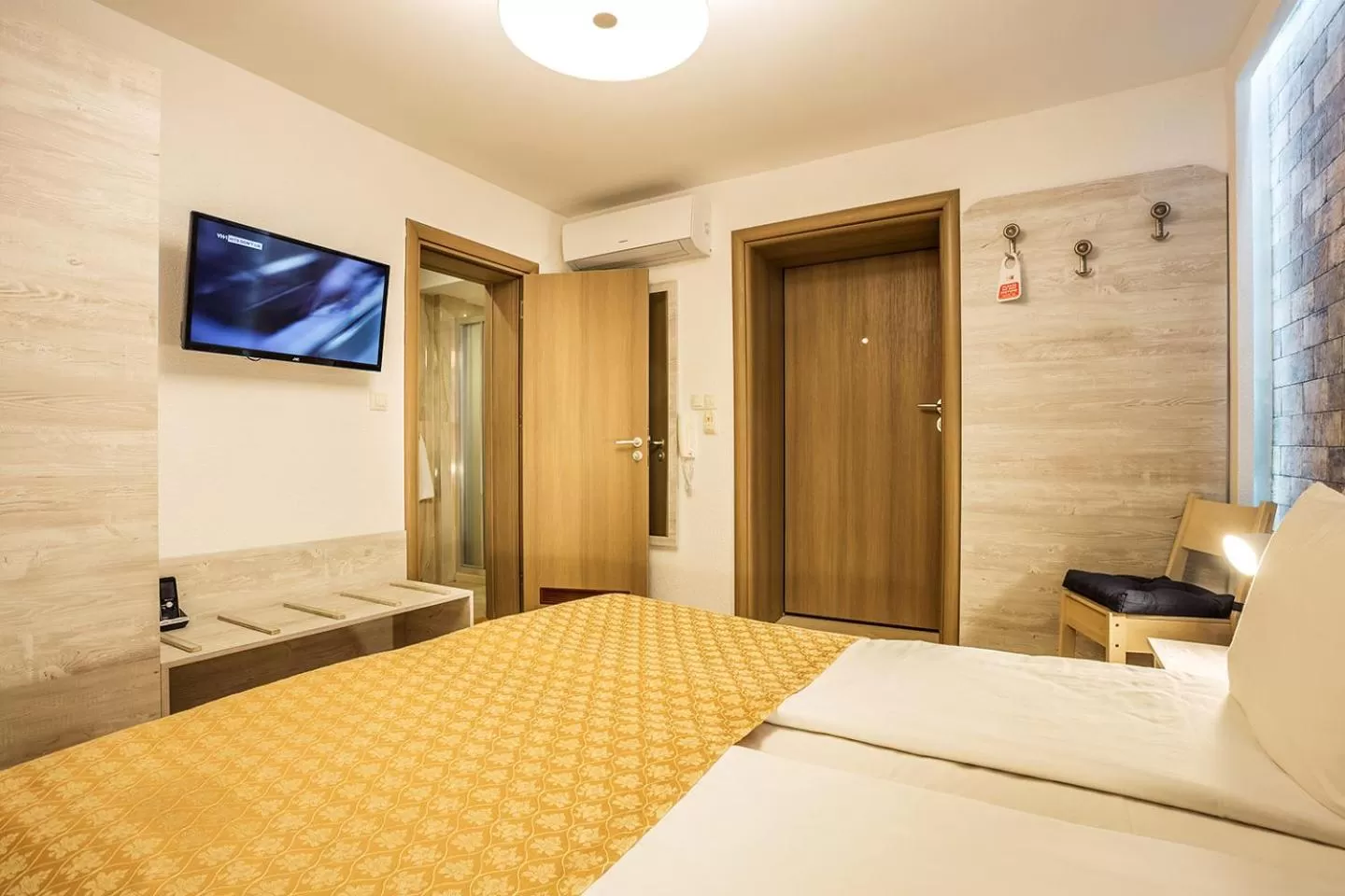 Communal lounge/ TV room, Bed in Sofia Place Hotel by HMG
