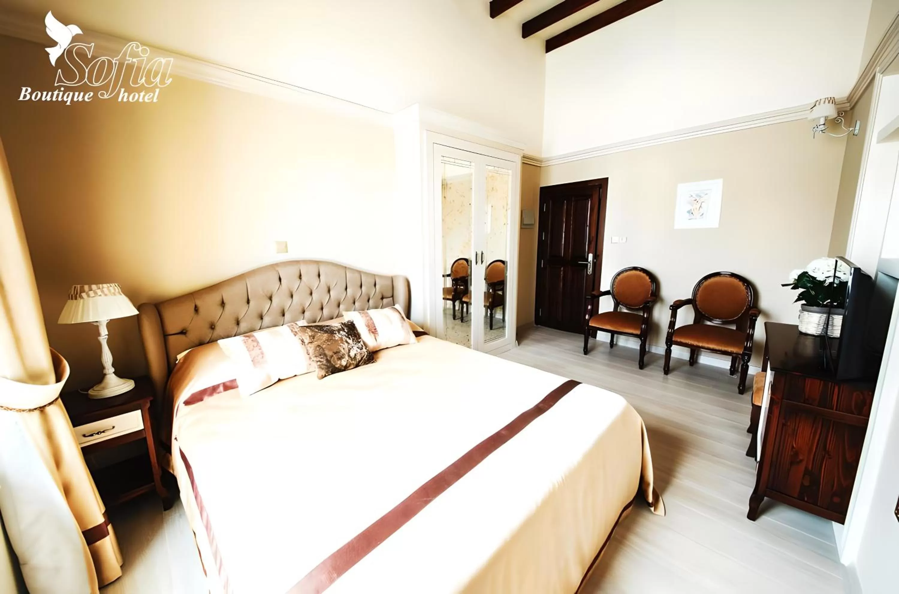 Bed in SOFIA BOUTIQUE HOTEL