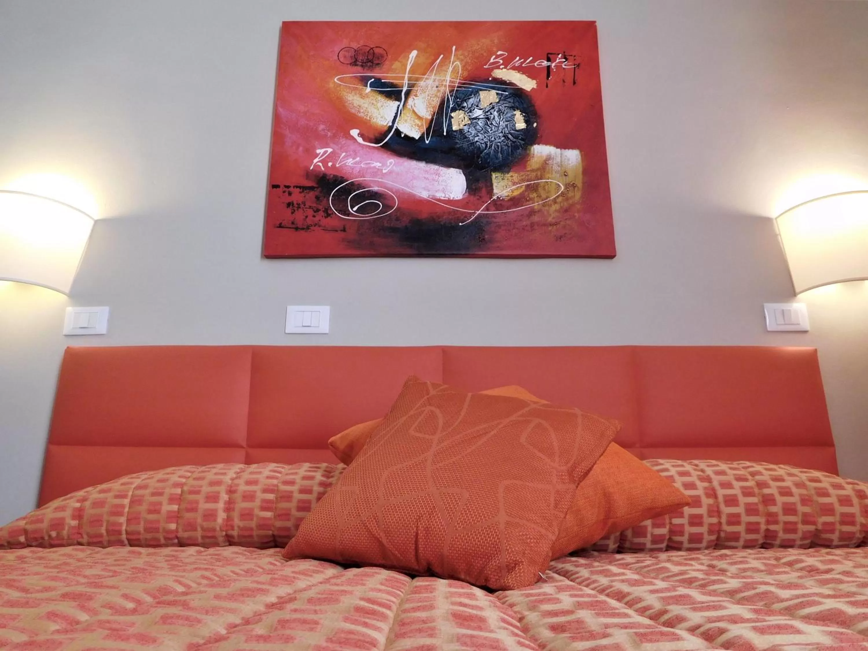 Bed in Moonlight Hotel&Suites