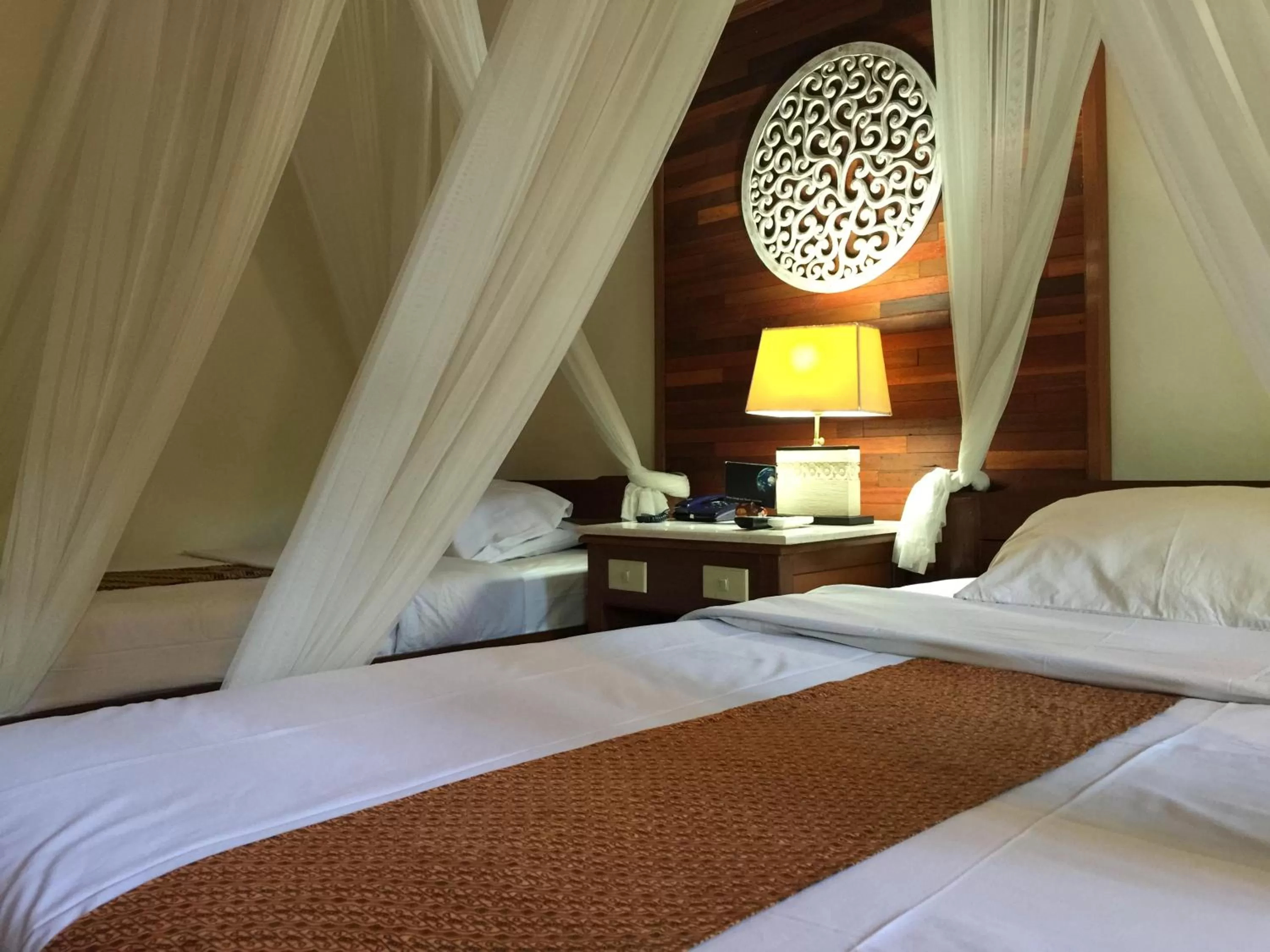 Photo of the whole room, Bed in Bumi Ayu Bungalow Sanur
