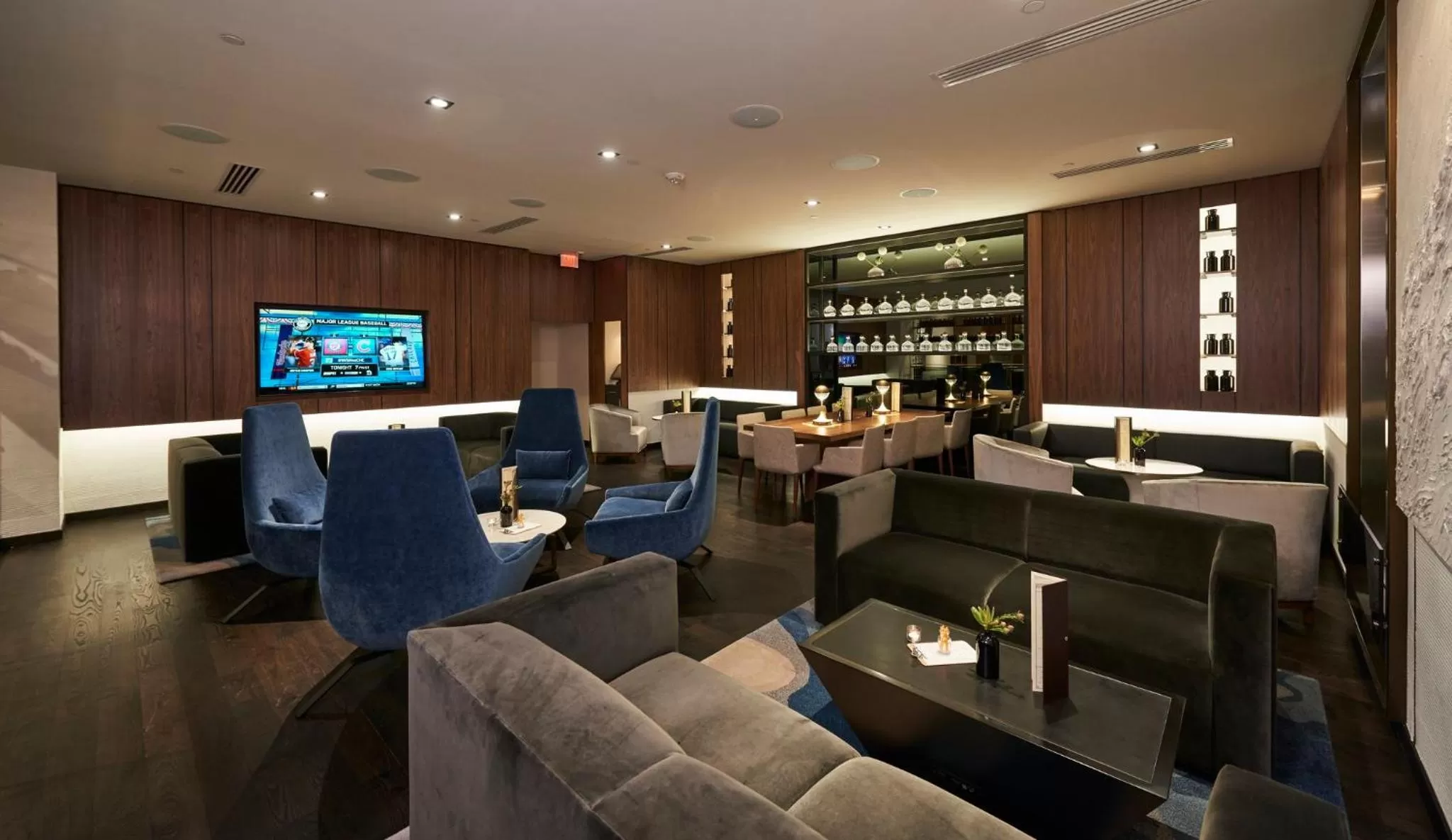 Communal lounge/ TV room in The Lofton Hotel Minneapolis, Tapestry Collection by Hilton