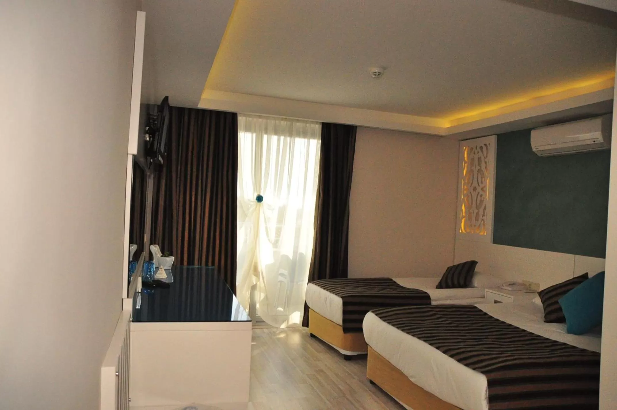 Photo of the whole room, Bed in Aura Boutique Hotel
