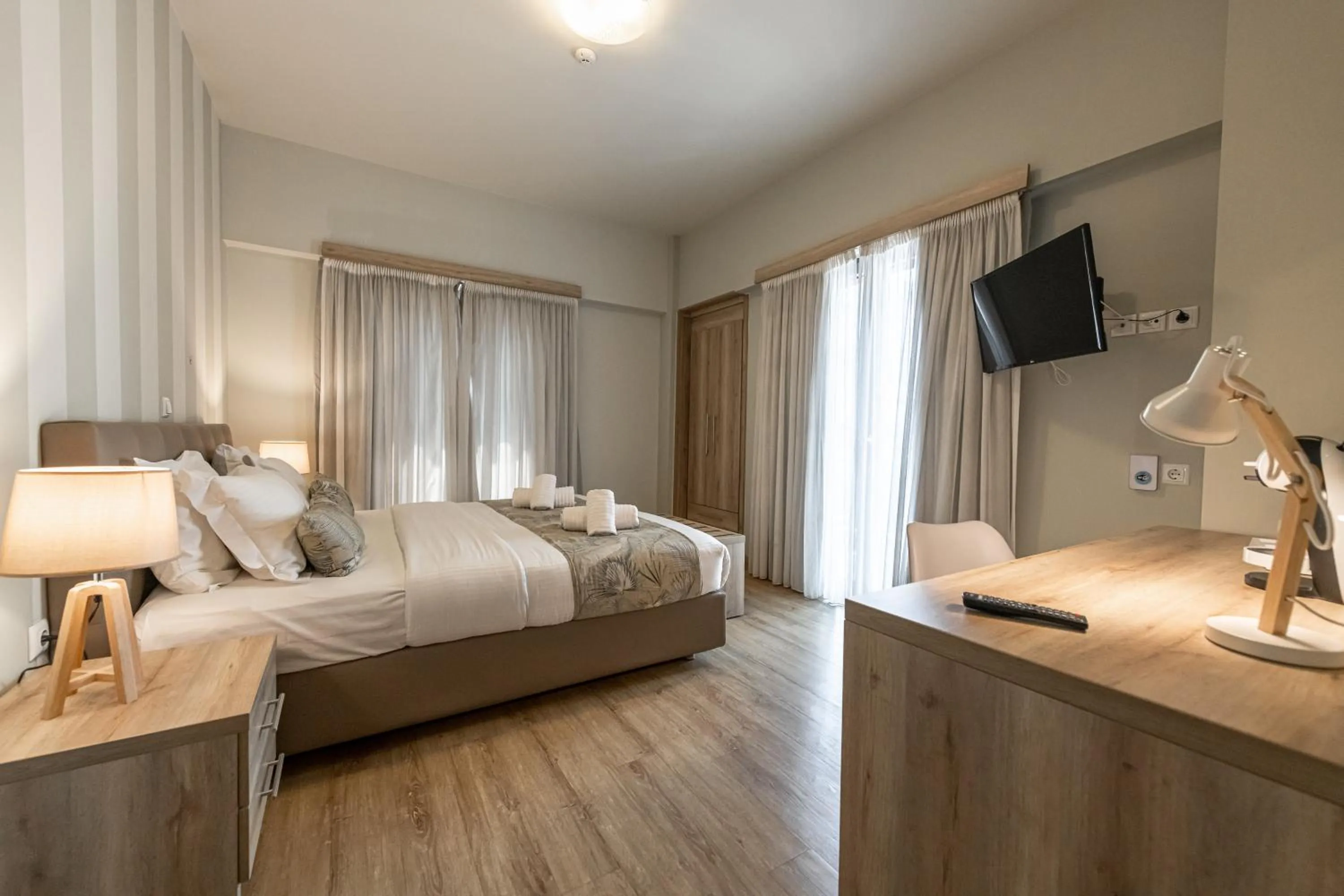 Bed in Hotel @Syngrou Fix