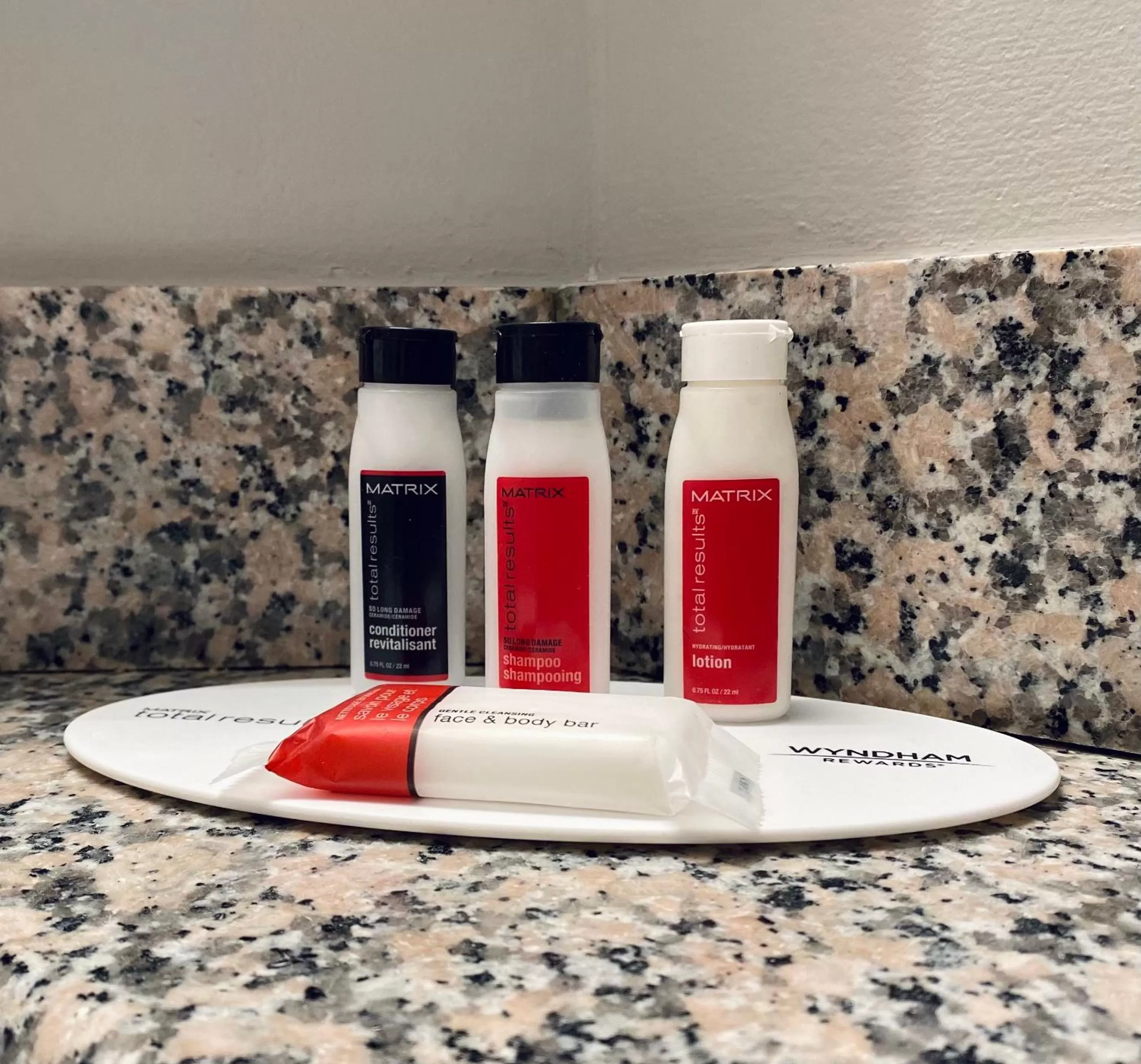 Bathroom in Ramada by Wyndham Hartford North - Bradley Airport