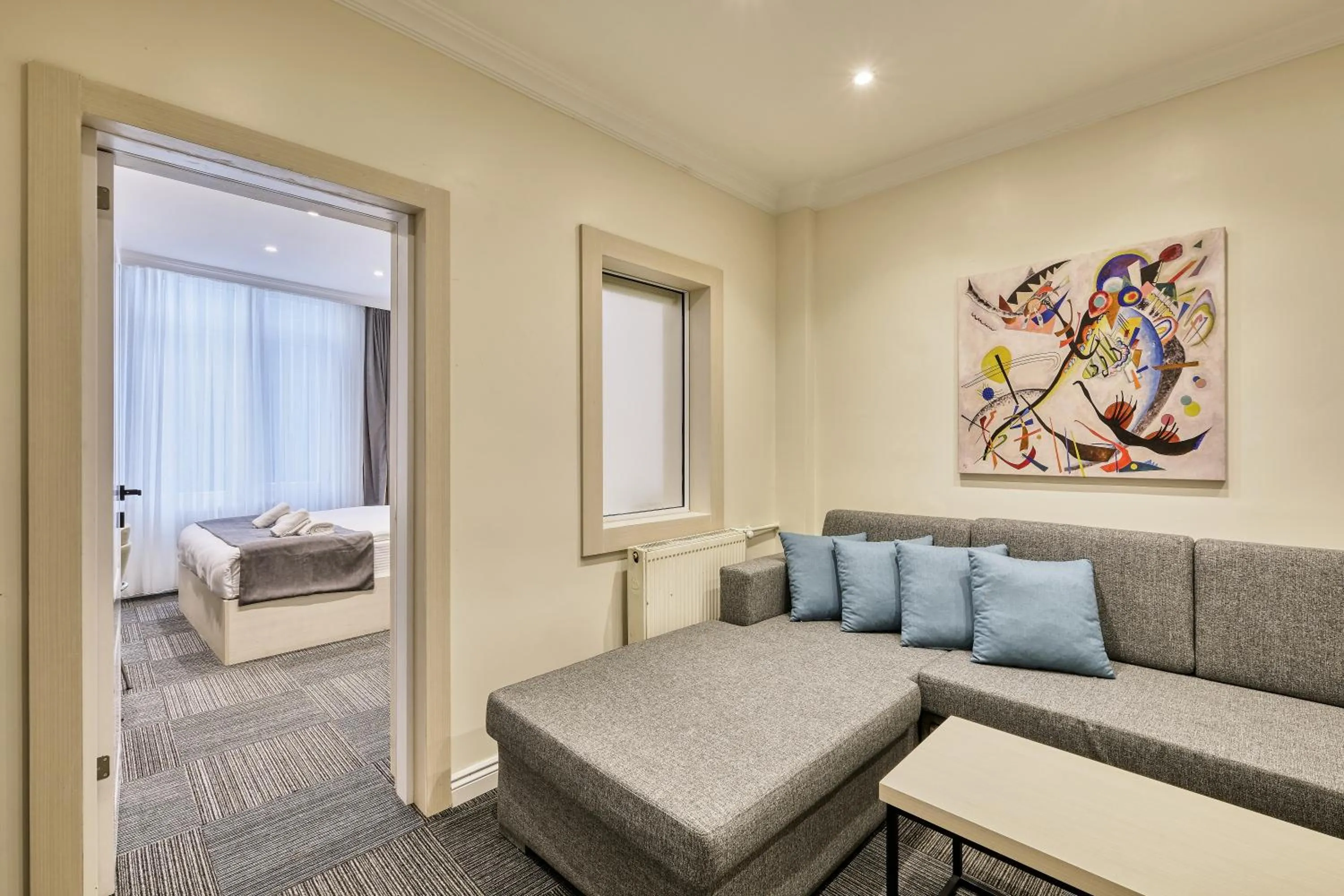 Living room, Bed in Hub Suite Istanbul