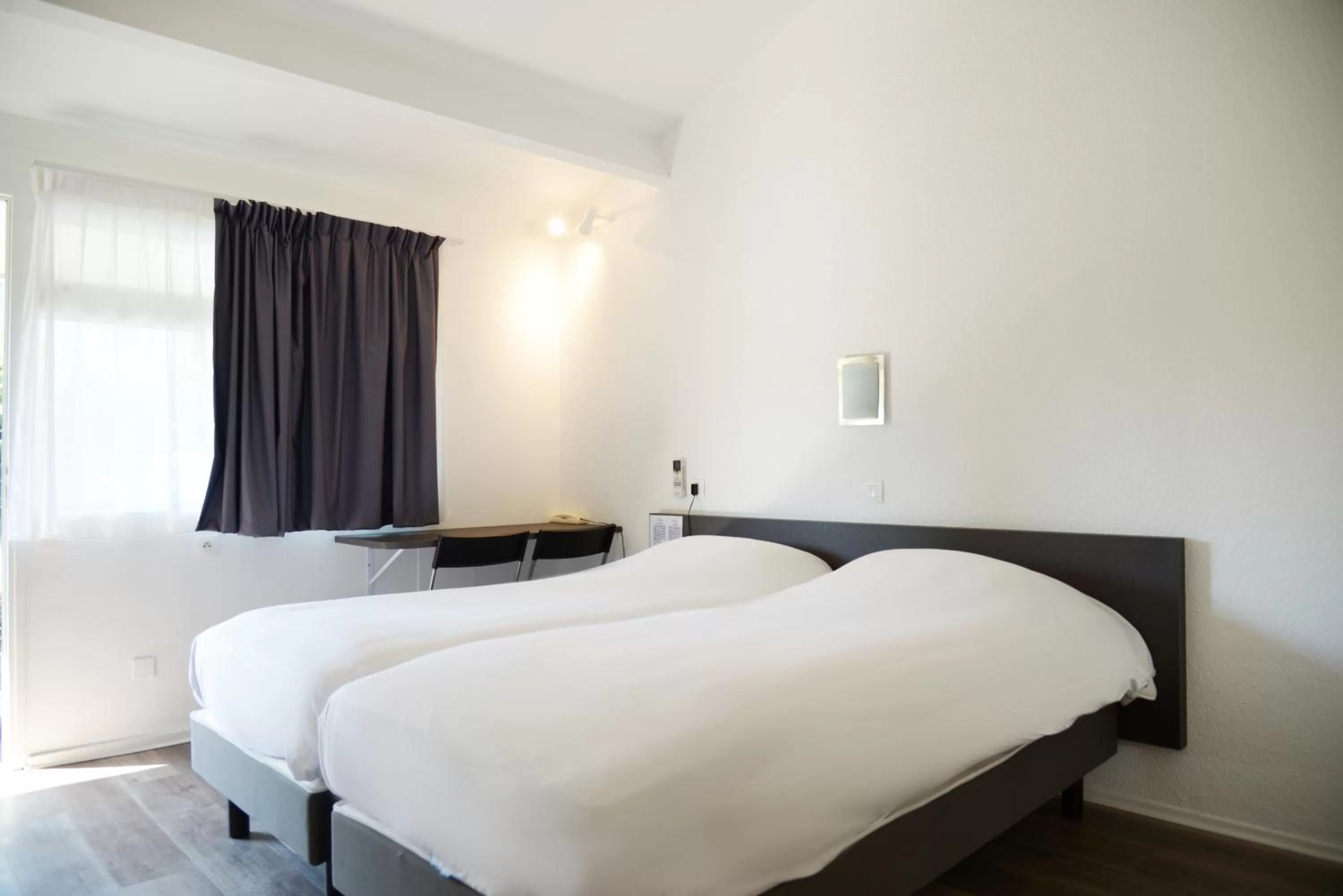 Photo of the whole room, Bed in Aerel Hotel Aéroport Blagnac