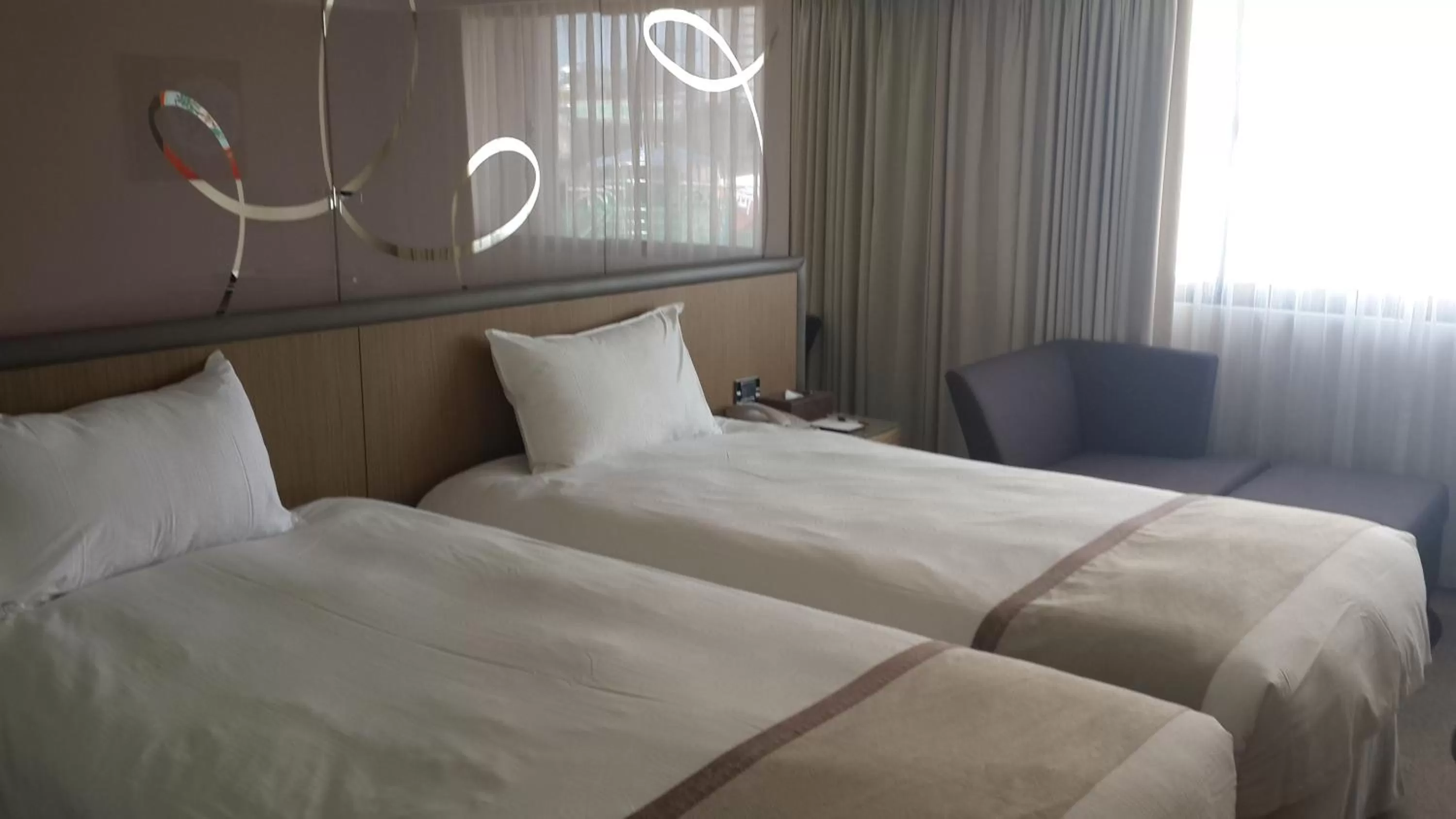 Bed in Kaohsiung Chateau de Chine Hotel