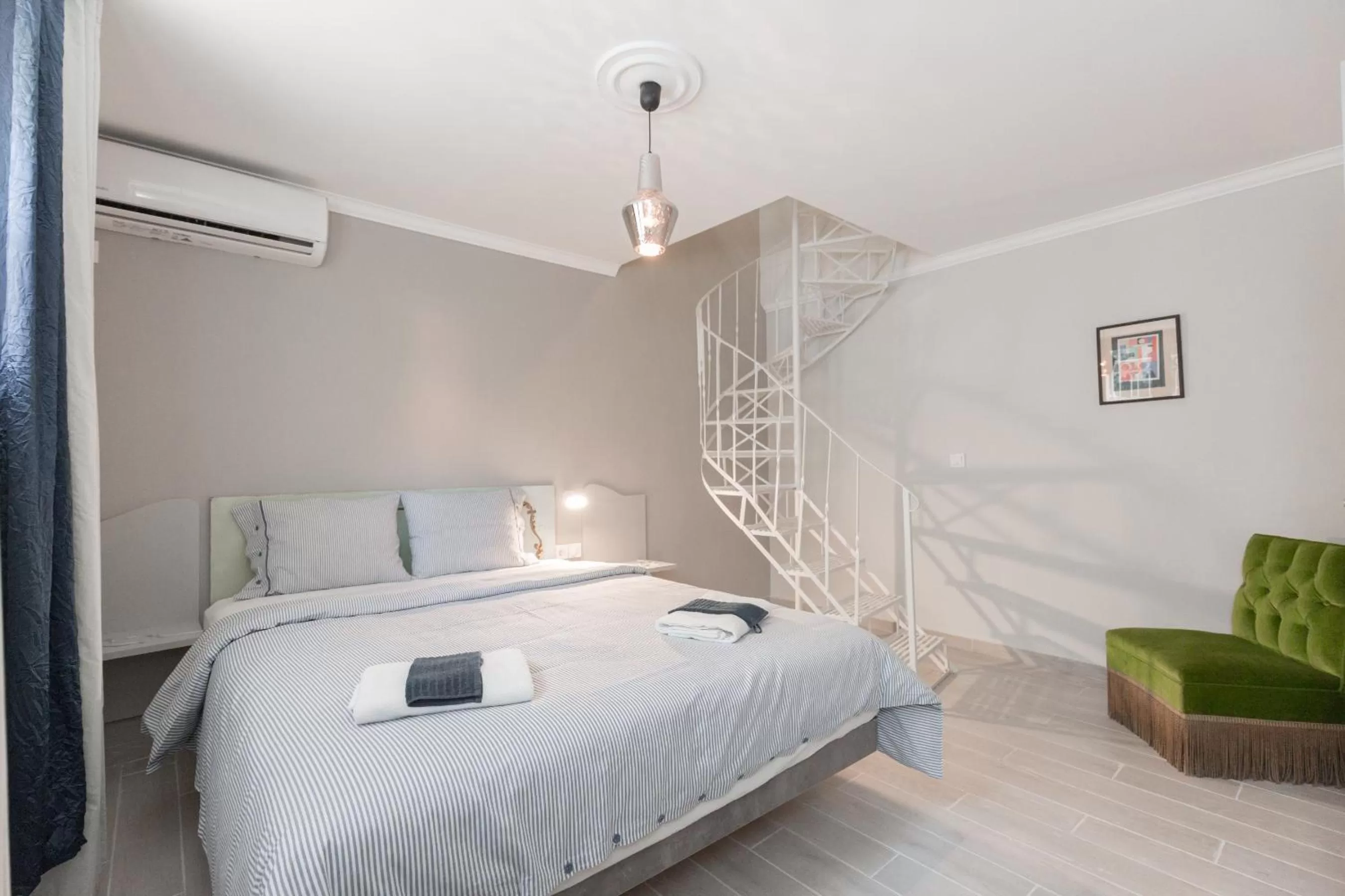 Bed in Troon of Athens Apartments